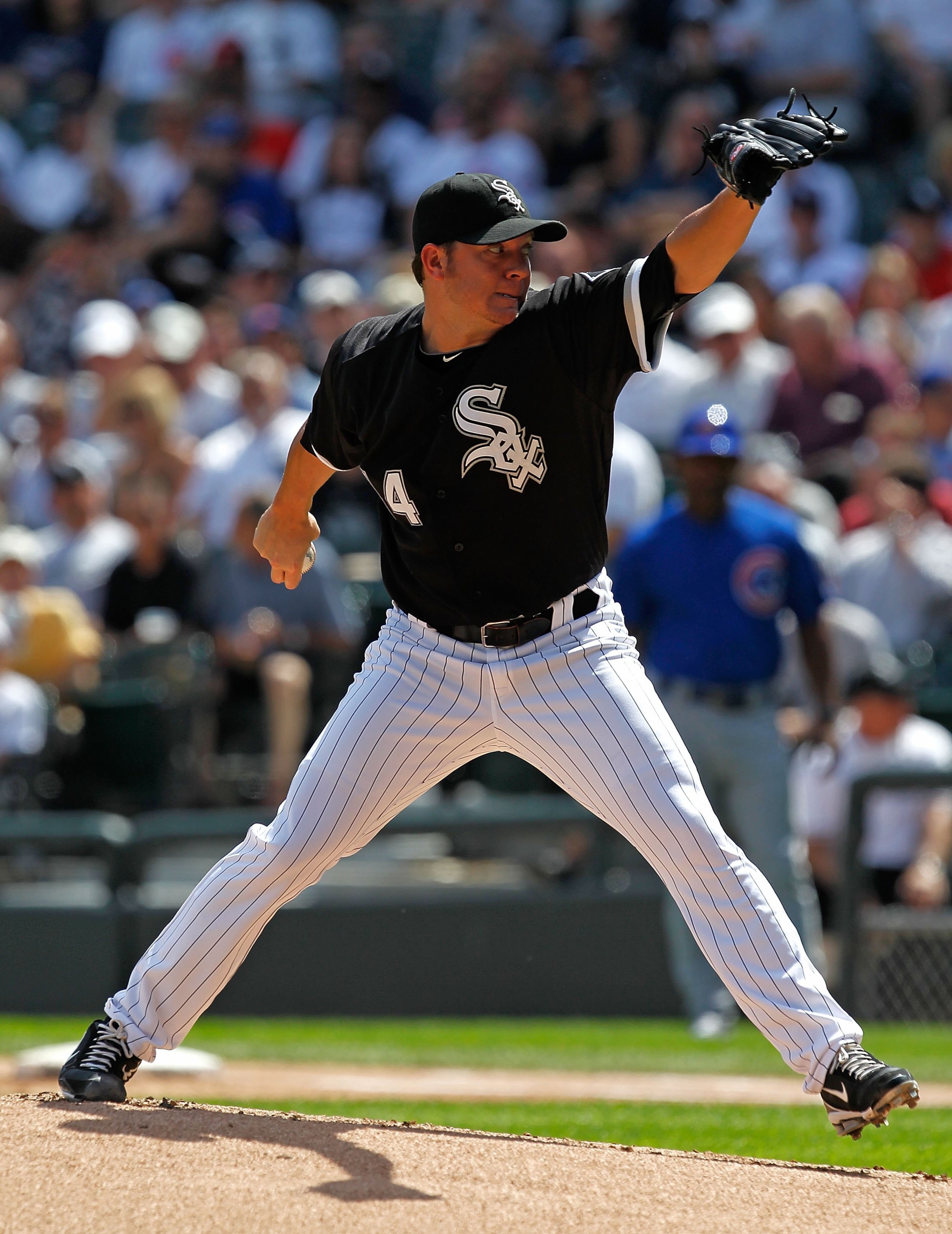 CHICAGO - JUNE 25: Starting pitcher Jake Peavy #44 of the Chicago White Sox delivers the ball against the Chicago Cubs at U.S. Cellular Field on June 25, 2010 in Chicago, Illinois. The White Sox defeated the Cubs 6-0. (Photo by Jonathan Daniel/Getty Image