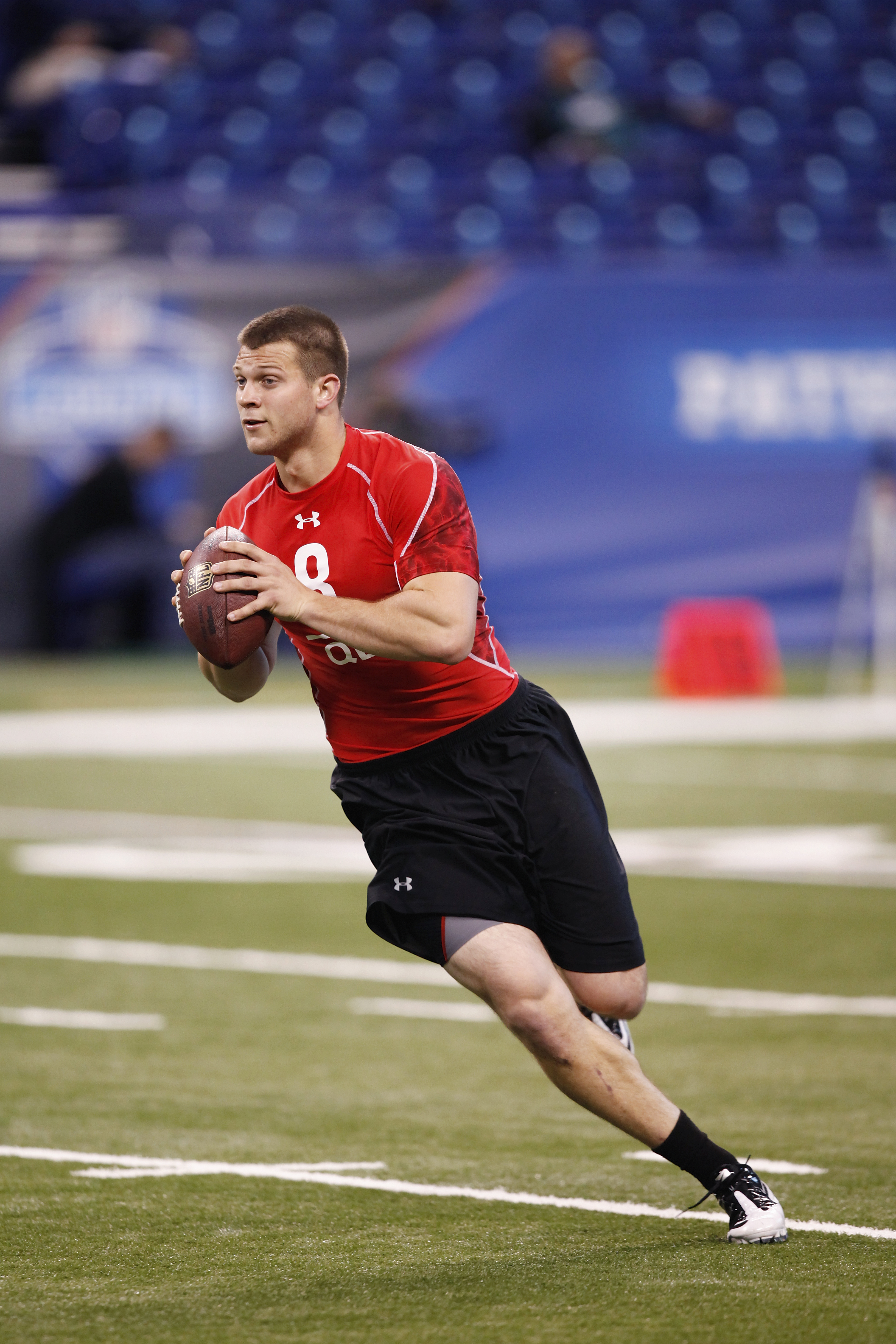 INDIANAPOLIS, IN - FEBRUARY 27:  Quarterback Jake Locker of Washington runs a passing drill during the 2011 NFL Scouting Combine at Lucas Oil Stadium on February 27, 2011 in Indianapolis, Indiana. (Photo by Joe Robbins/Getty Images)