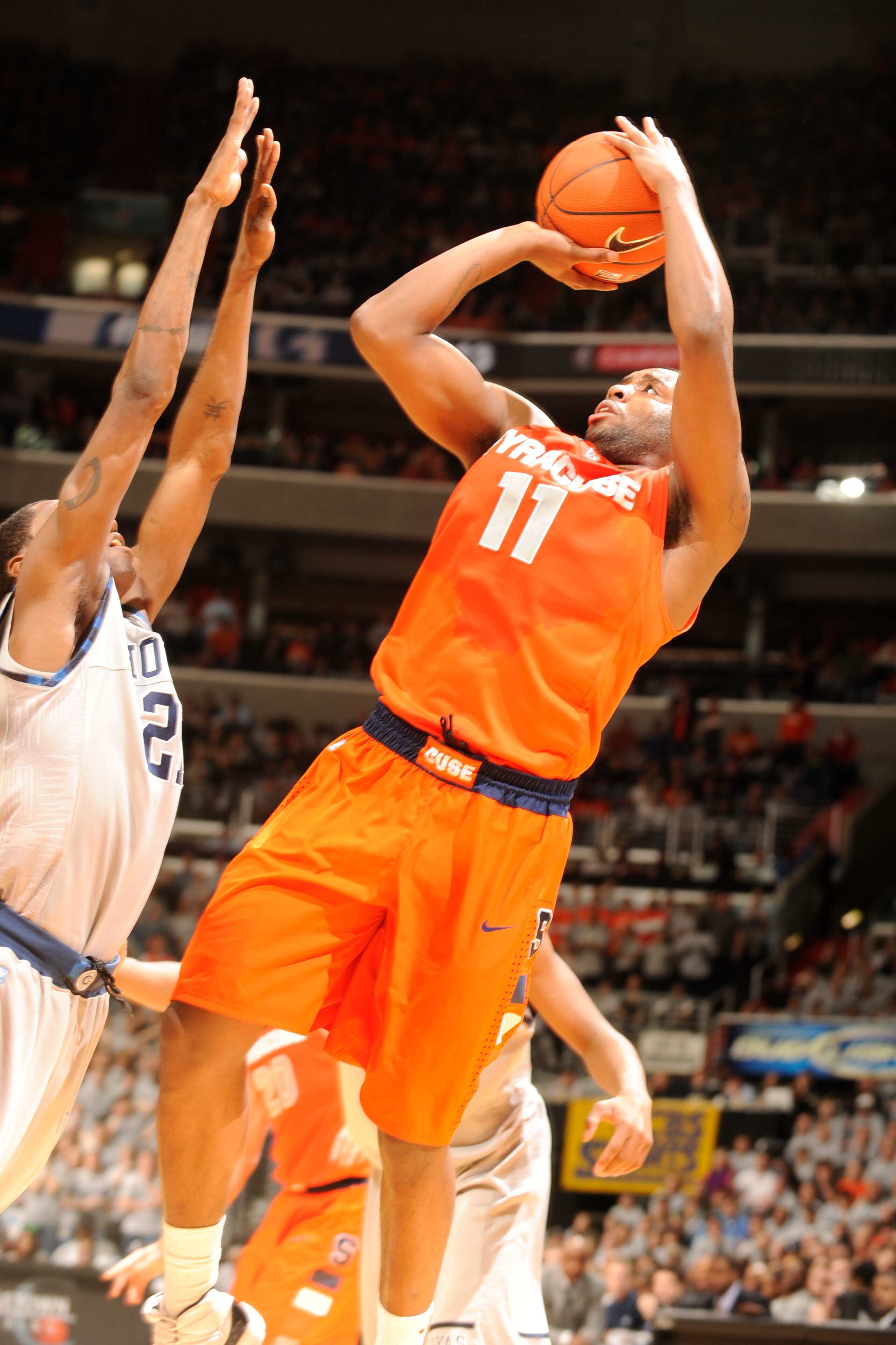 WASHINGTON, DC - FEBRUARY 26:  Scoop Jardine #11 of the Syracuse Orange takes a shot during a college basketball game against the Georgetown Hoyas on February 26, 2011 at the Verizon Center in Washington, DC  The Orange 58-51.  (Photo by Mitchell Layton/G
