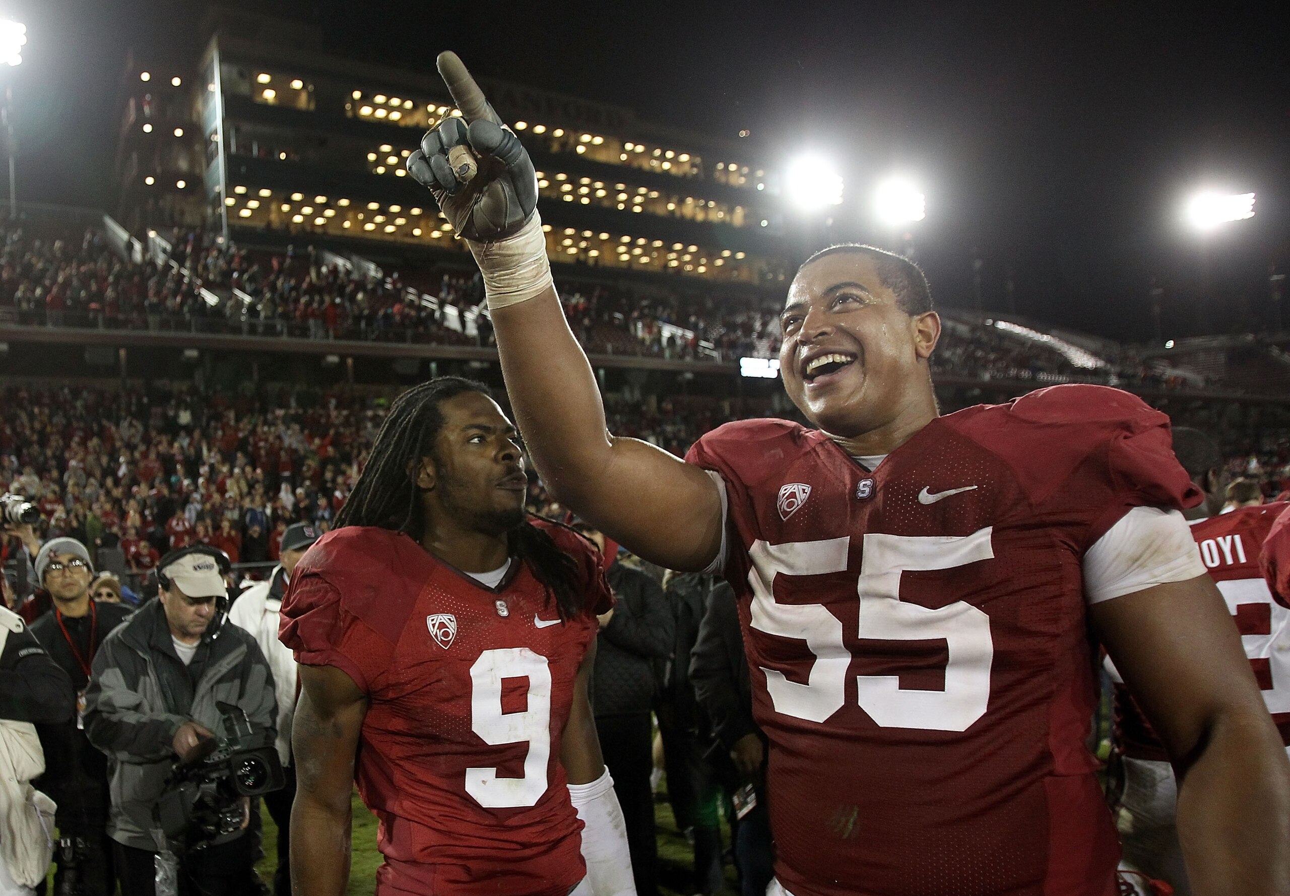 PALO ALTO, CA - NOVEMBER 27:  Jonathan Martin #55 and Richard Sherman #9 of the Stanford Cardinal celebrate after they beat the Oregon State Beavers at Stanford Stadium on November 27, 2010 in Palo Alto, California.  (Photo by Ezra Shaw/Getty Images)