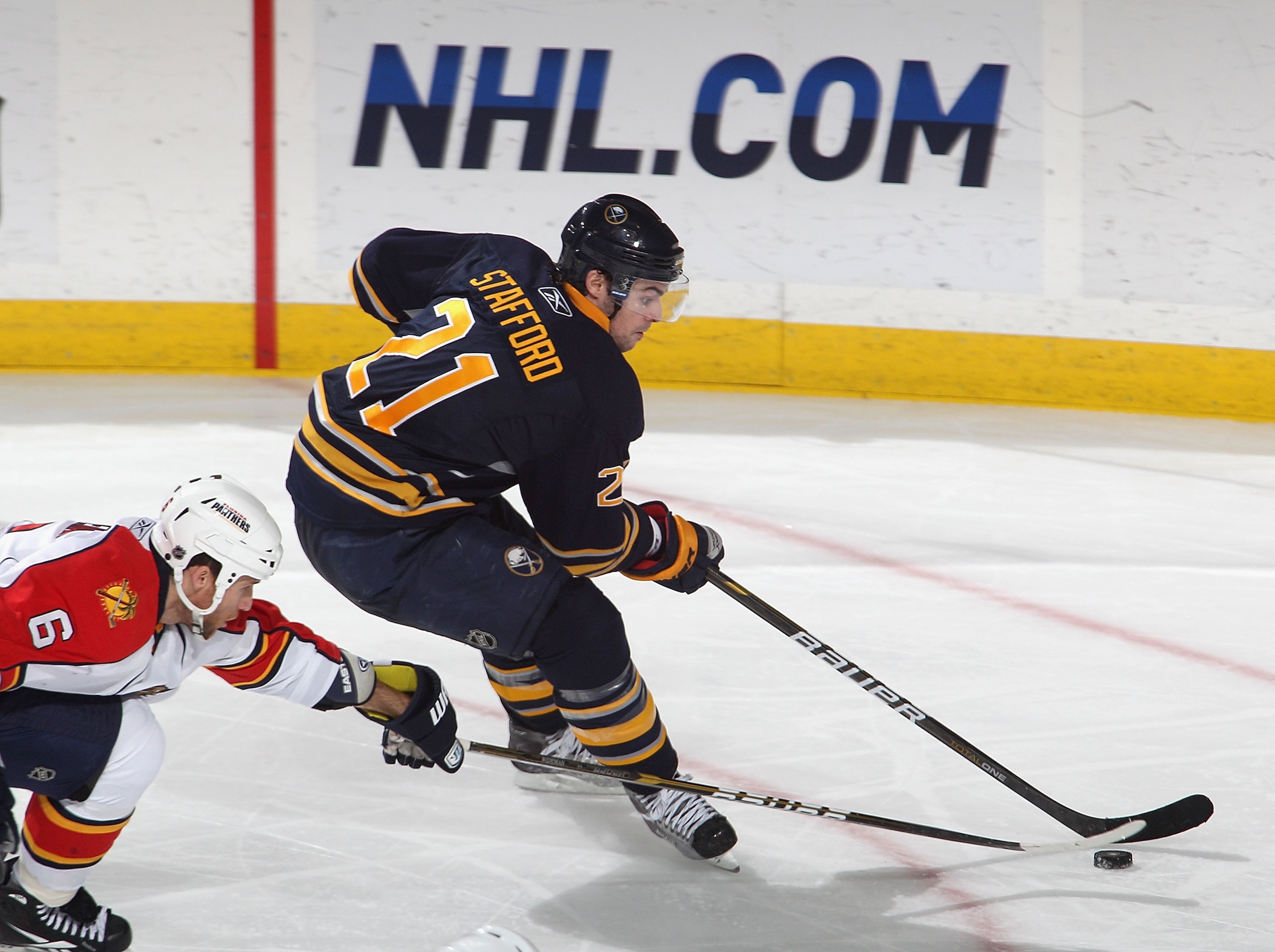BUFFALO, NY - DECEMBER 23: Drew Stafford #21 of the Buffalo Sabres skates against Dennis Wideman #6 of the Florida Panthers at HSBC Arena on December 23, 2010 in Buffalo, New York. Florida won 4-3.  (Photo by Rick Stewart/Getty Images)