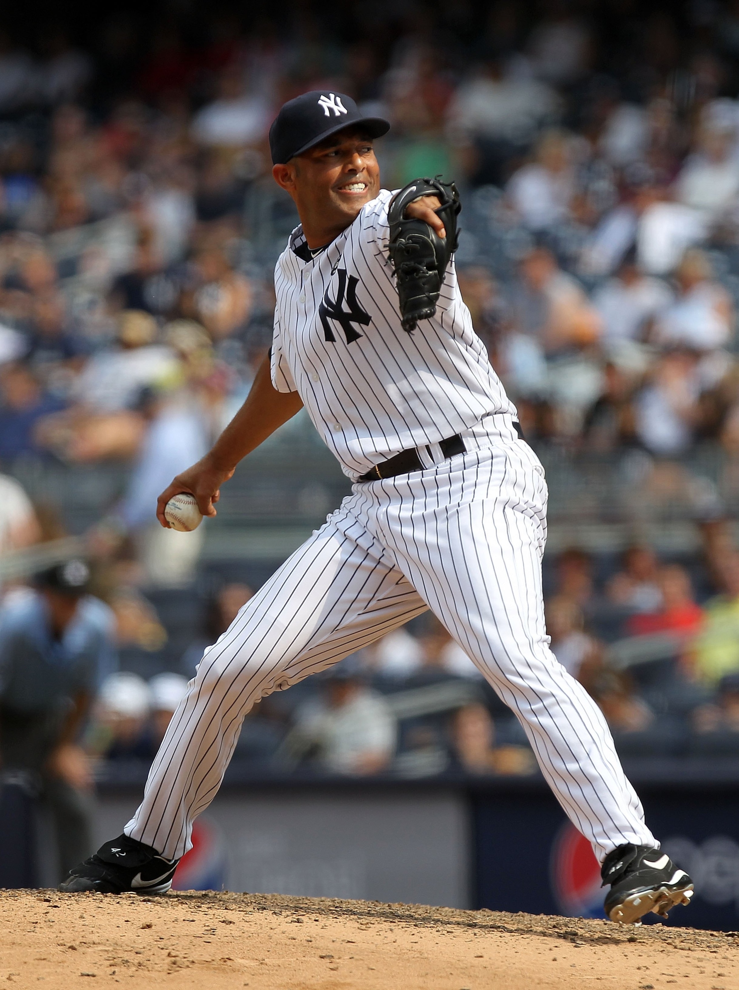 NEW YORK - JULY 21:  Mariano Rivera #42 of the New York Yankees pitches against the Los Angeles Angels of Anaheim at Yankee Stadium on July 21, 2010 in the Bronx borough of New York City.  (Photo by Nick Laham/Getty Images)