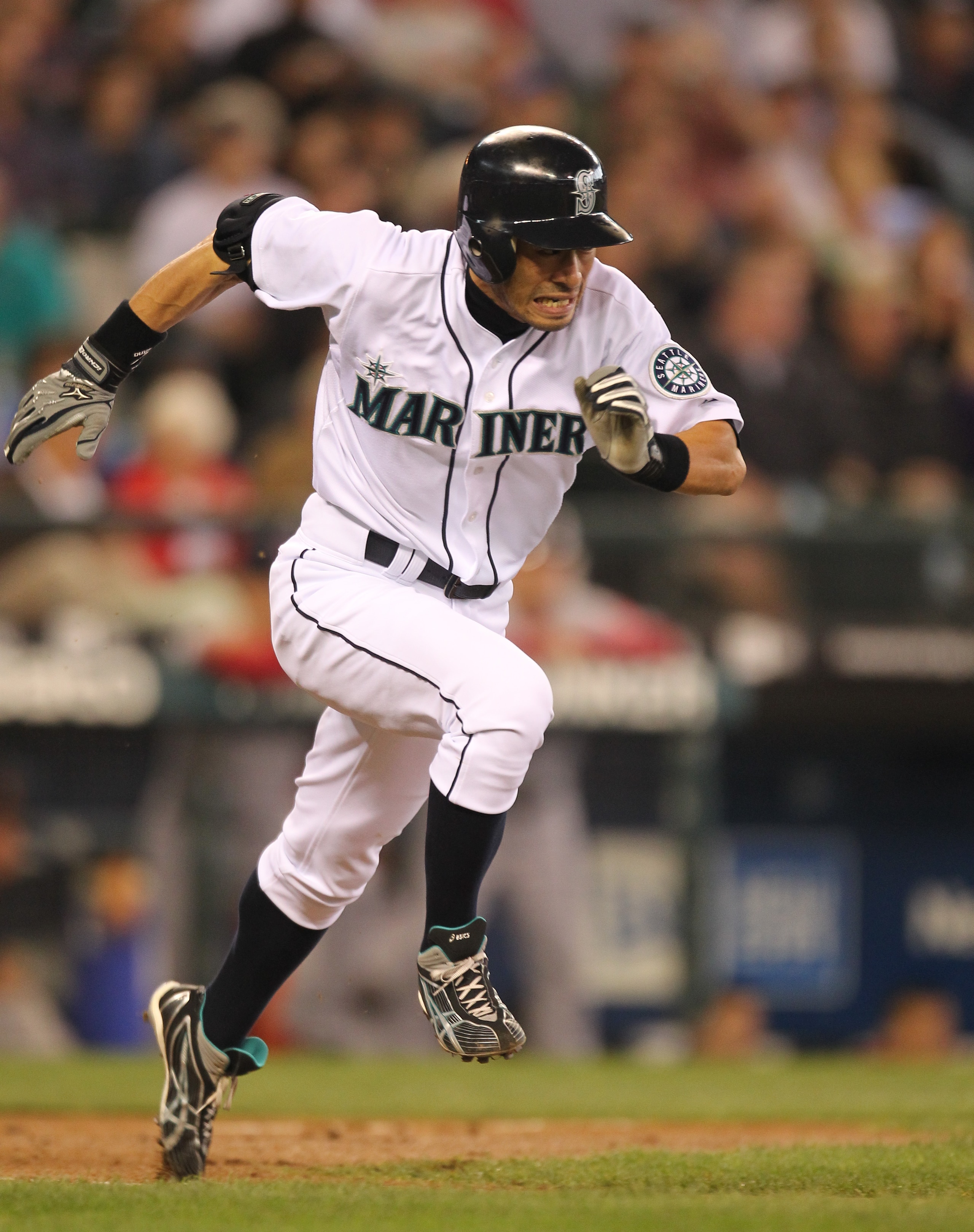 SEATTLE - SEPTEMBER 15:  Ichiro Suzuki #51 of the Seattle Mariners runs to first on a ground out against the Boston Red Sox at Safeco Field on September 15, 2010 in Seattle, Washington. (Photo by Otto Greule Jr/Getty Images)