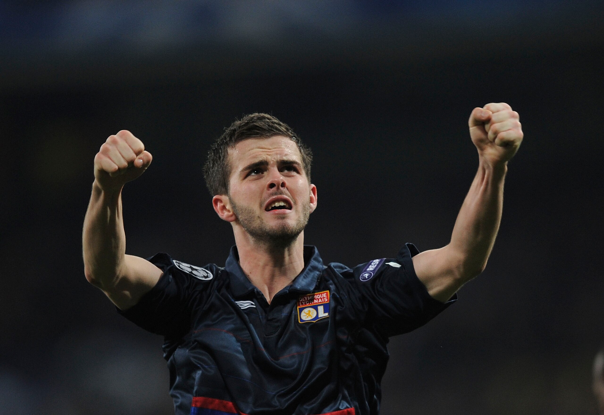MADRID, SPAIN - MARCH 10:  Miralem Pjanic of Olympique Lyonnais celebrates after scoring Lyonnais' first goal during the UEFA Champions League round of 16 2nd leg match between  Real Madrid and Olympique Lyonnais at Estadio Santiago Bernabeu on March 10,