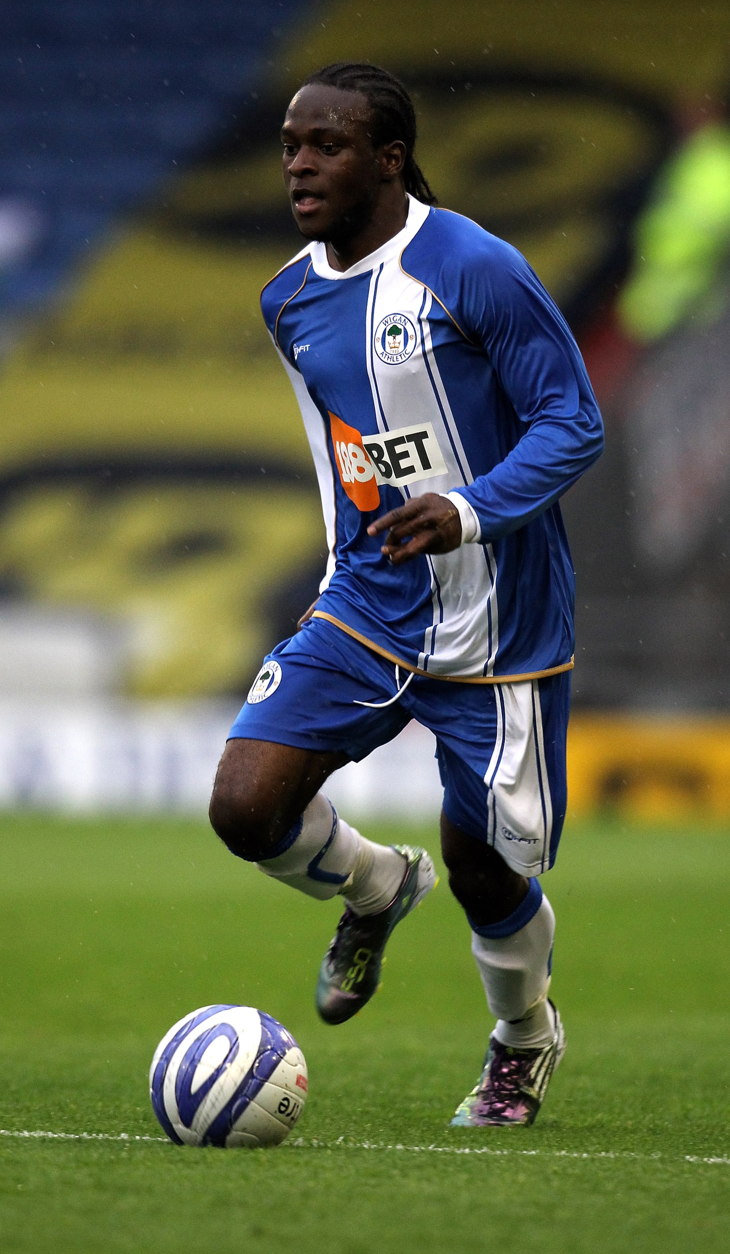 OLDHAM, ENGLAND - JULY 20:  Victor Moses of Wigan runs with the ball during the pre season friendly match between Oldham Athletic and Wigan Athletic at Boundary Park on July 20, 2010 in Oldham, England.  (Photo by David Rogers/Getty Images)