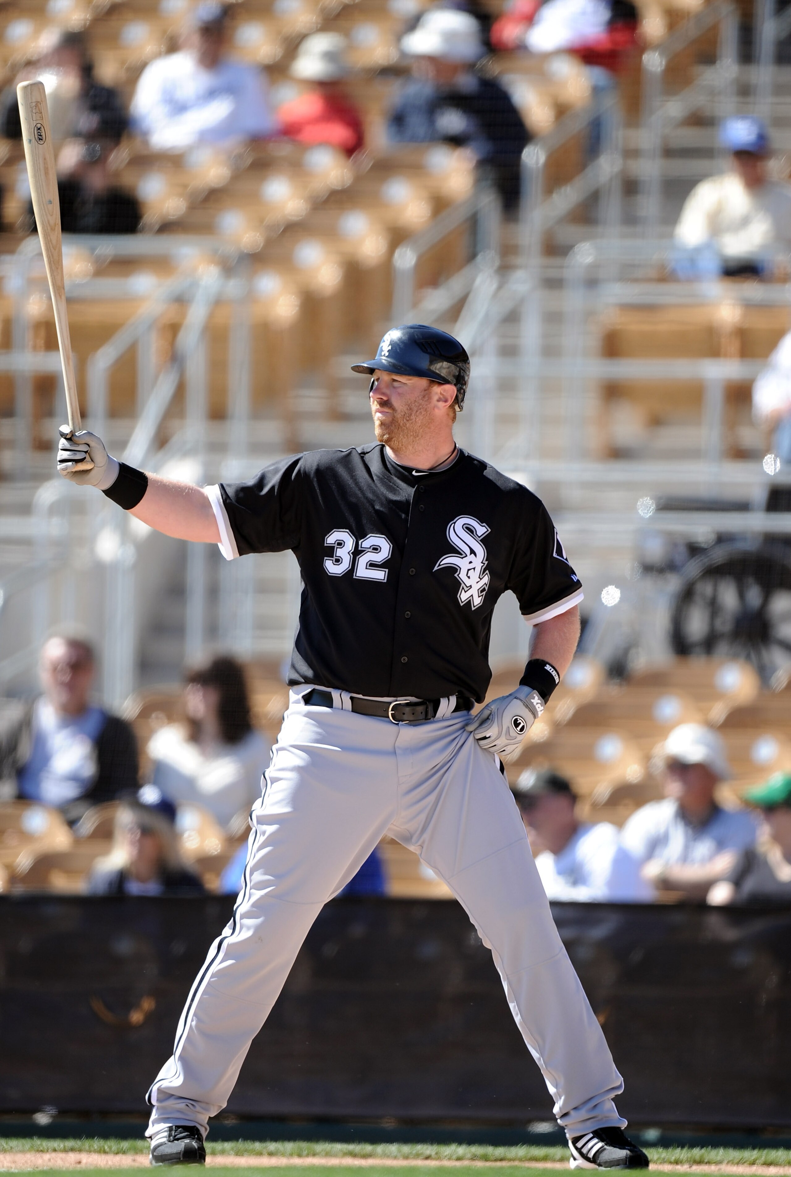 PHOENIX, AZ - FEBRUARY 28:  Adam Dunn #32 of the Chicago White Sox at bat against the Los Angeles Dodgers during spring training at Camelback Ranch on February 28, 2011 in Phoenix, Arizona.  (Photo by Harry How/Getty Images)