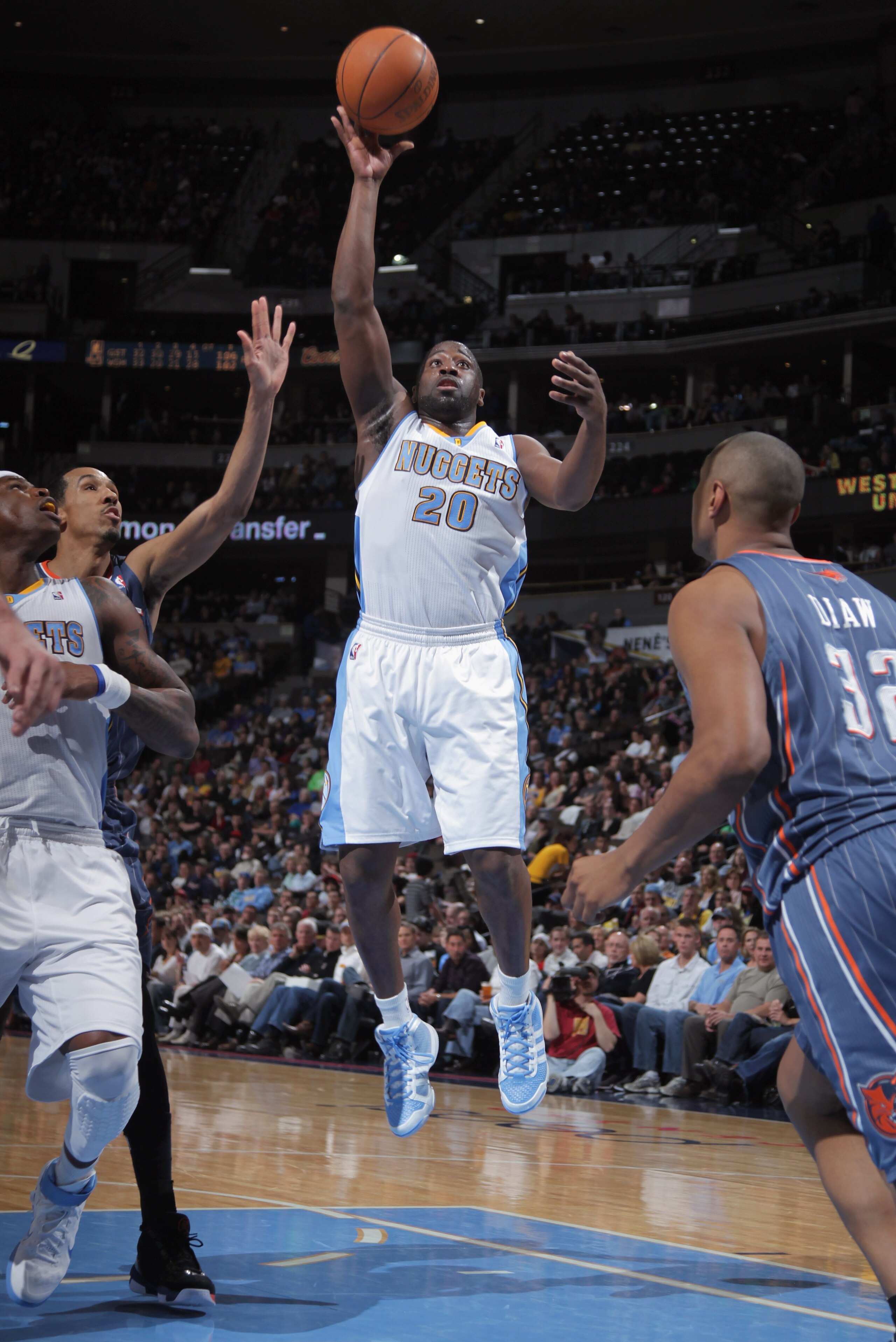 DENVER, CO - MARCH 02:  Raymond Felton #20 of the Denver Nuggets lays up a shot against the Charlotte Bobcats at the Pepsi Center on March 2, 2011 in Denver, Colorado. NOTE TO USER: User expressly acknowledges and agrees that, by downloading and or using