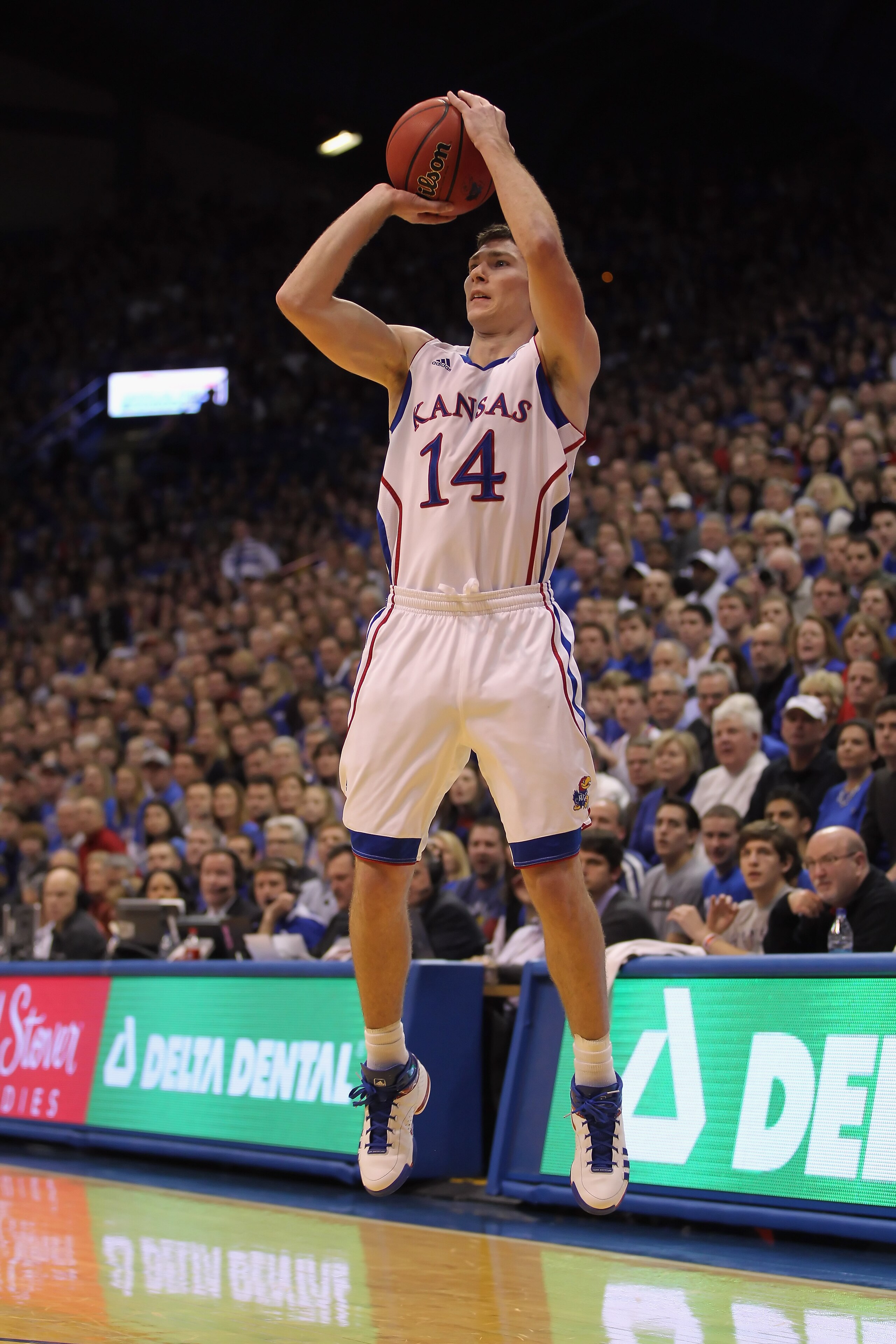LAWRENCE, KS - DECEMBER 29: Tyrel Reed #14 of the Kansas Jayhawks in action during the game against the University of Texas Arlington Mavericks on December 29, 2010 at Allen Fieldhouse in Lawrence, Kansas. (Photo by Jamie Squire/Getty Images) LAWRENCE, KS - DECEMBER 29: Tyrel Reed #14 of the Kansas Jayhawks in action during the game against the University of Texas Arlington Mavericks on December 29, 2010 at Allen Fieldhouse in Lawrence, Kansas. (Photo by Jamie Squire/Getty Images)