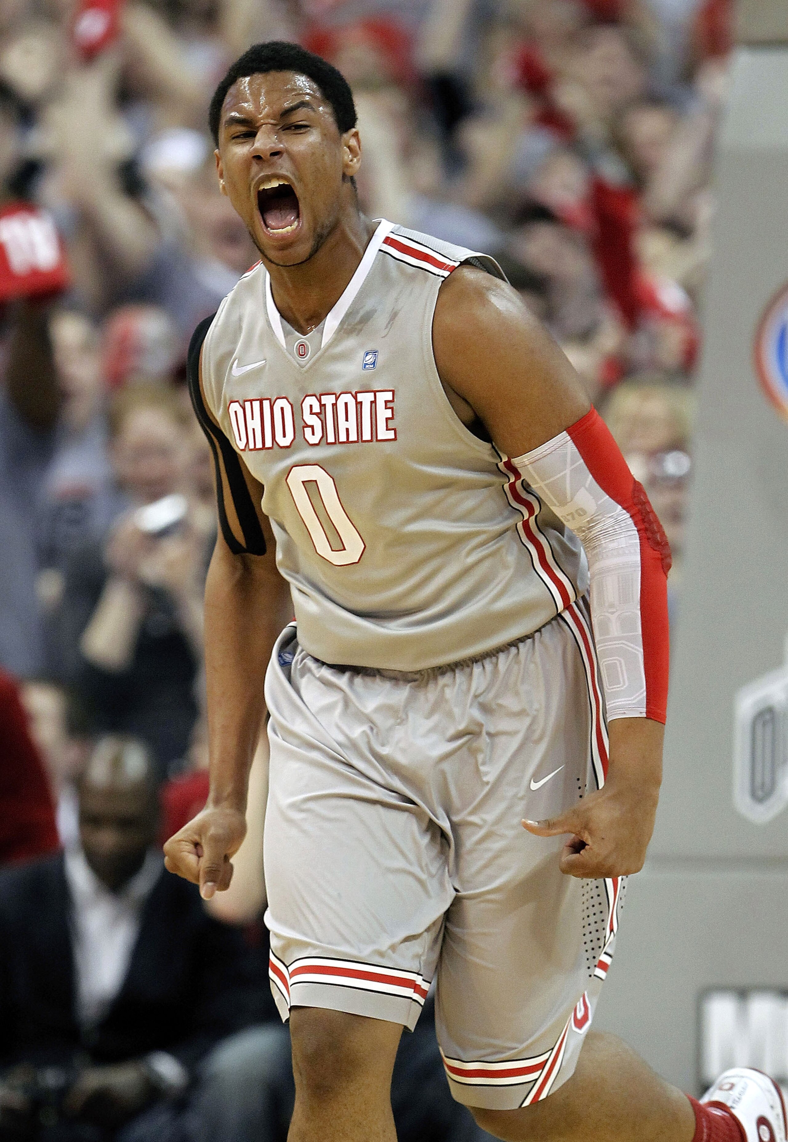 COLUMBUS, OH - MARCH 06: Jared Sullinger #0 of the Ohio State Buckeyes reacts after a first half dunk while playing the Wisconsin Badgers on March 6, 2011 at the Value City Arena in Columbus, Ohio.  (Photo by Gregory Shamus/Getty Images)