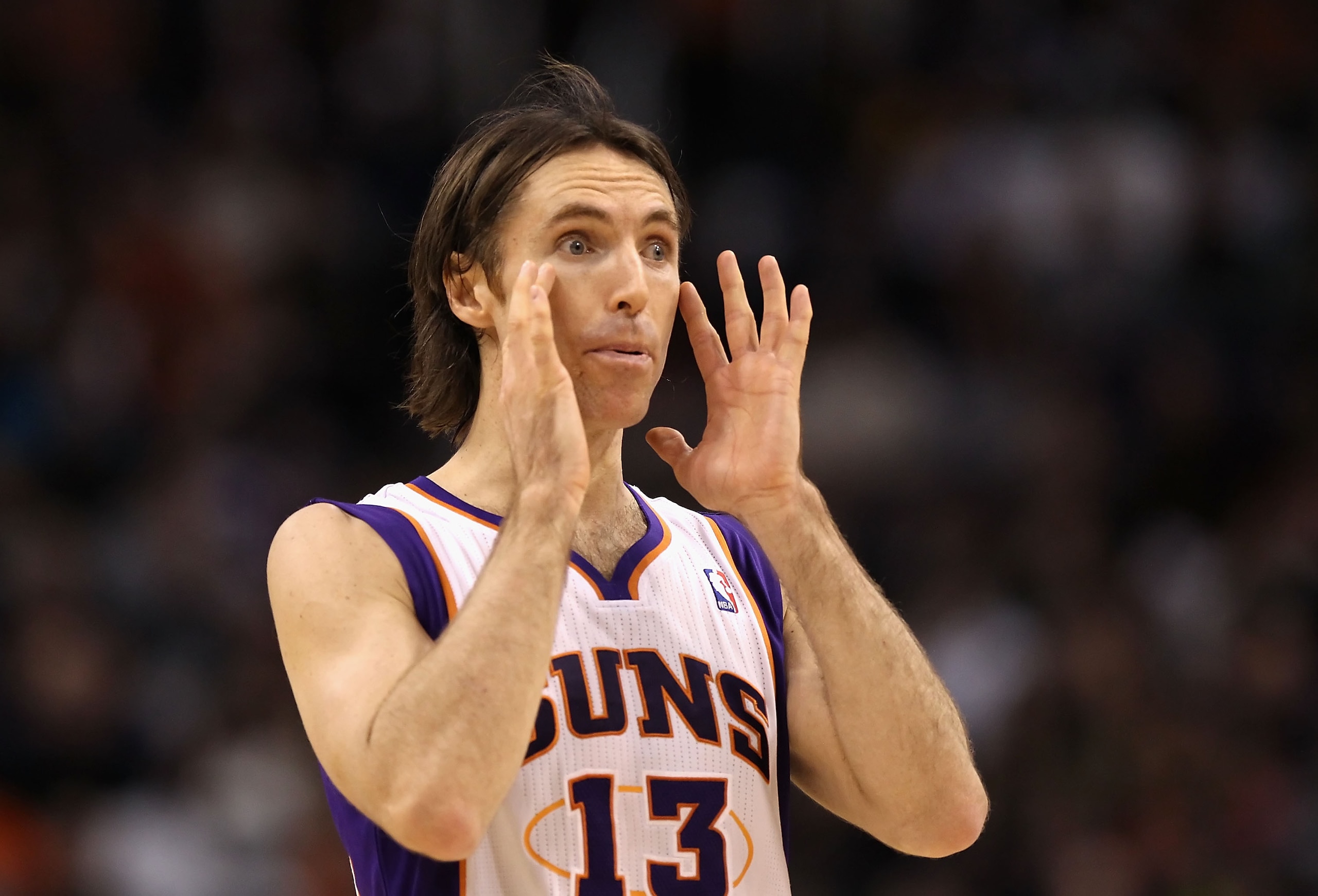 PHOENIX, AZ - JANUARY 28:  Steve Nash #13 of the Phoenix Suns during the NBA game against the Boston Celtics at US Airways Center on January 28, 2011 in Phoenix, Arizona. The Suns defeated the Celtics 88-71. NOTE TO USER: User expressly acknowledges and a