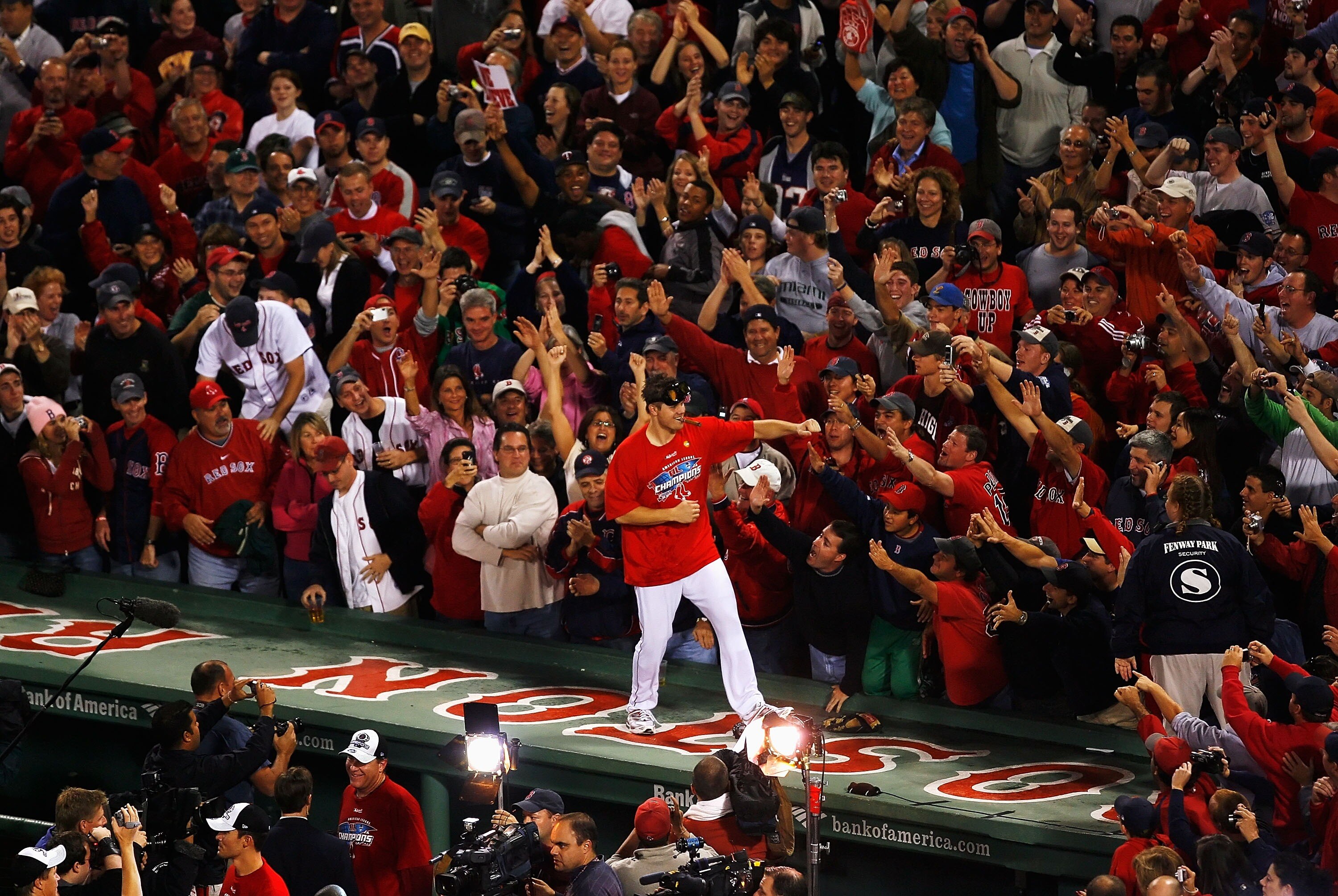 BOSTON - OCTOBER 21:  Jonathan Papelbon #58 of the Boston Red Sox dances on the top of the dugout after defeating the Cleveland Indians by the score of 11-2 to win the American League Championship Series at Fenway Park on October 21, 2007 in Boston, Massa