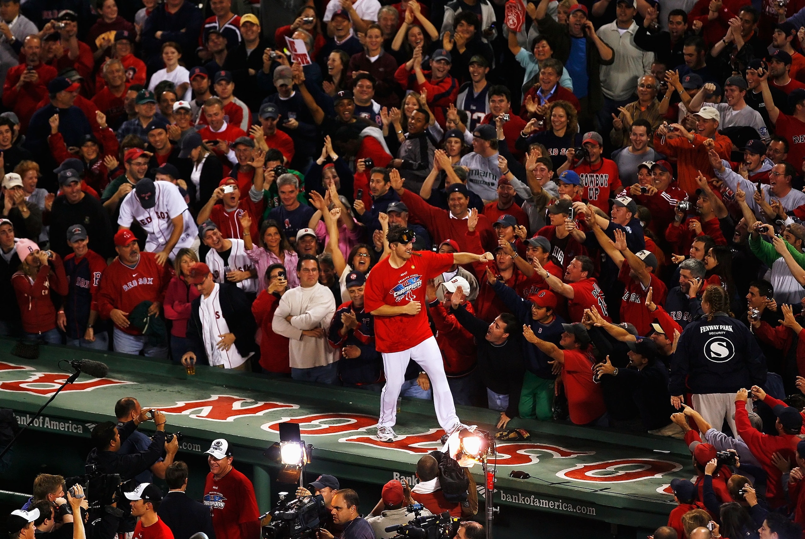 BOSTON - OCTOBER 21:  Jonathan Papelbon #58 of the Boston Red Sox dances on the top of the dugout after defeating the Cleveland Indians by the score of 11-2 to win the American League Championship Series at Fenway Park on October 21, 2007 in Boston, Massa