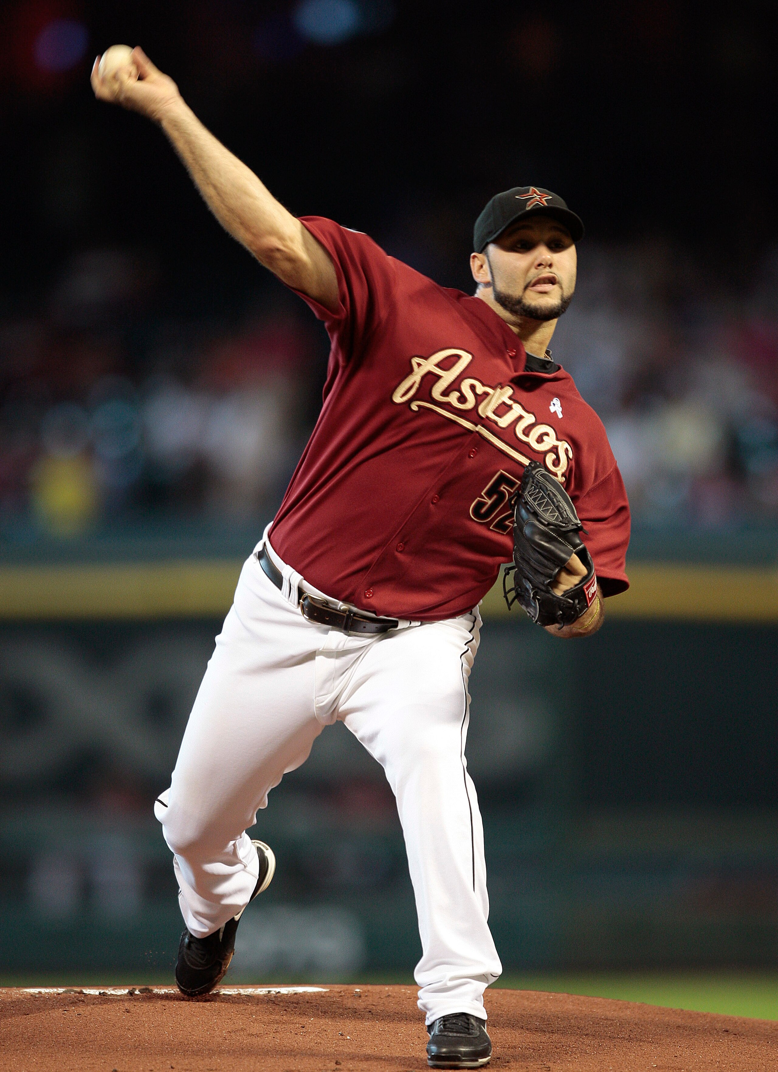 HOUSTON - JUNE 20:  Pitcher Felipe Paulino #52 of the Houston Astros throws in the first inning against the Texas Rangers at Minute Maid Park on June 20, 2010 in Houston, Texas.  (Photo by Bob Levey/Getty Images)
