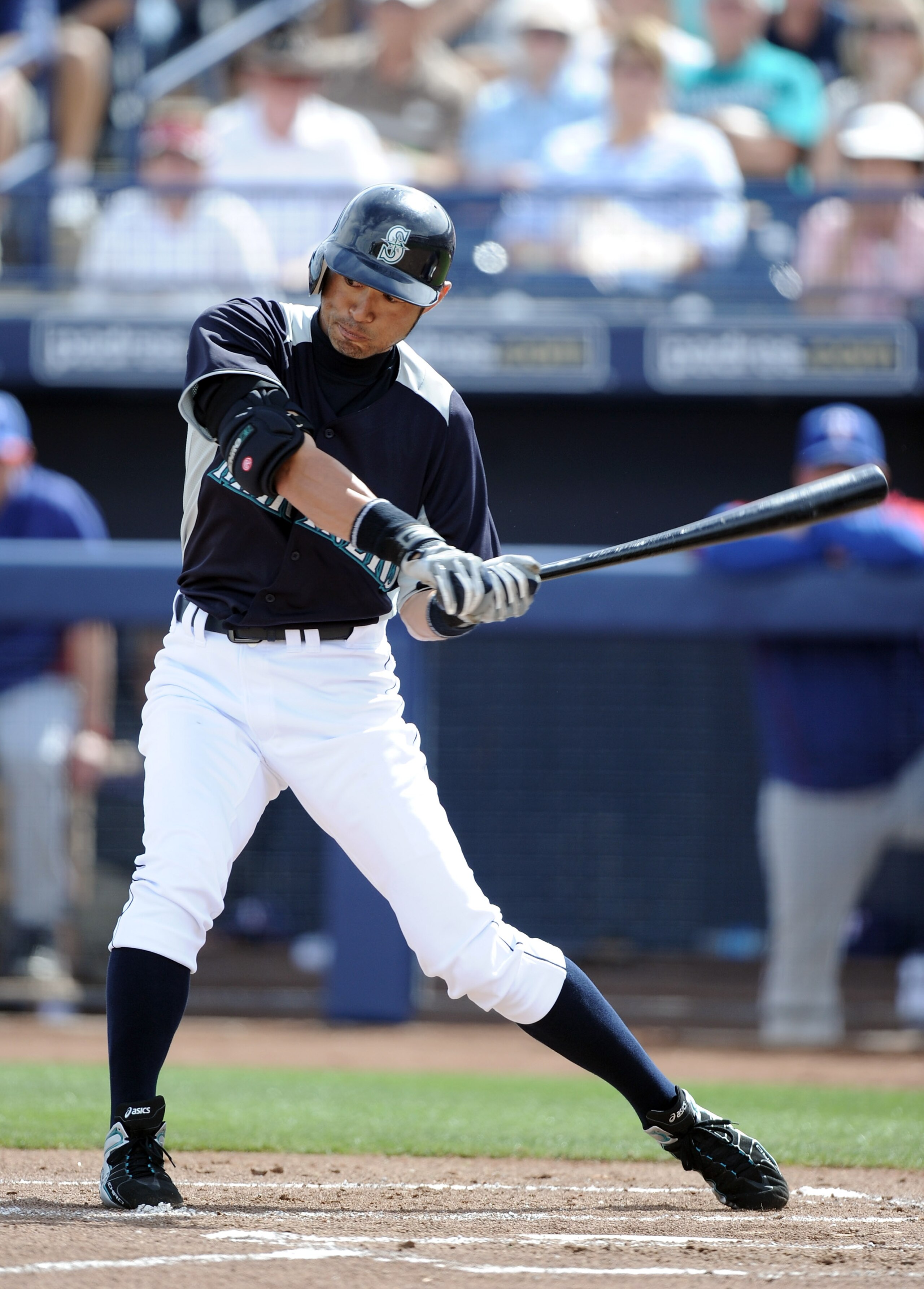 PEORIA, AZ - MARCH 01:  Ichiro Suzuki #51 of the  Seattle Mariners at bat against the Texas Rangers during spring training at Peoria Stadium on March 1, 2011 in Peoria, Arizona.  (Photo by Harry How/Getty Images)