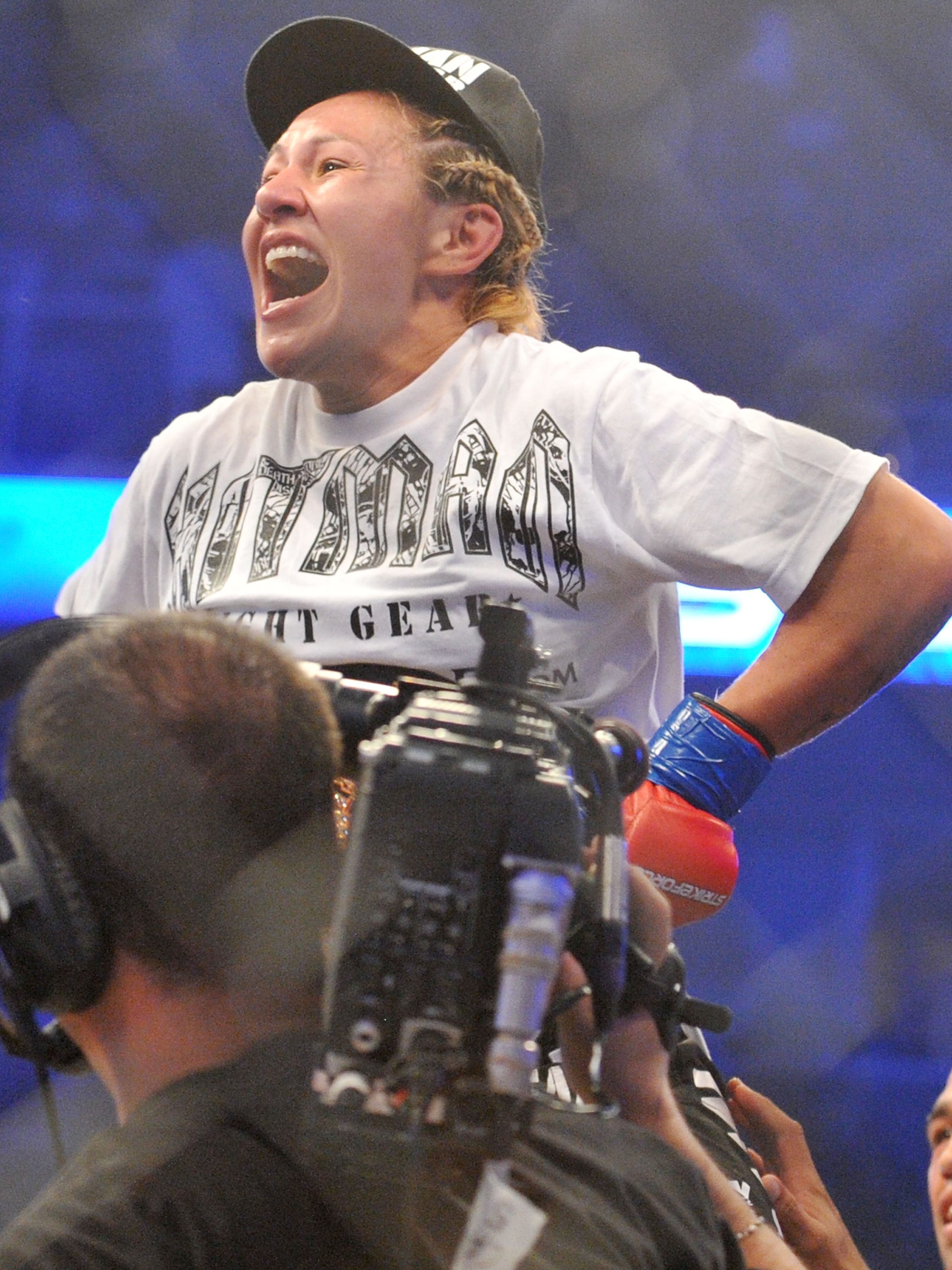 SAN JOSE, CA - AUGUST 15:  Cris Cyborg celebrates after defeating Gina Carano during their Middleweight Championship Title fight at Stikeforce: Carano vs. Cyborg on August 15, 2009 in San Jose, California.  (Photo by Jon Kopaloff/Getty Images)