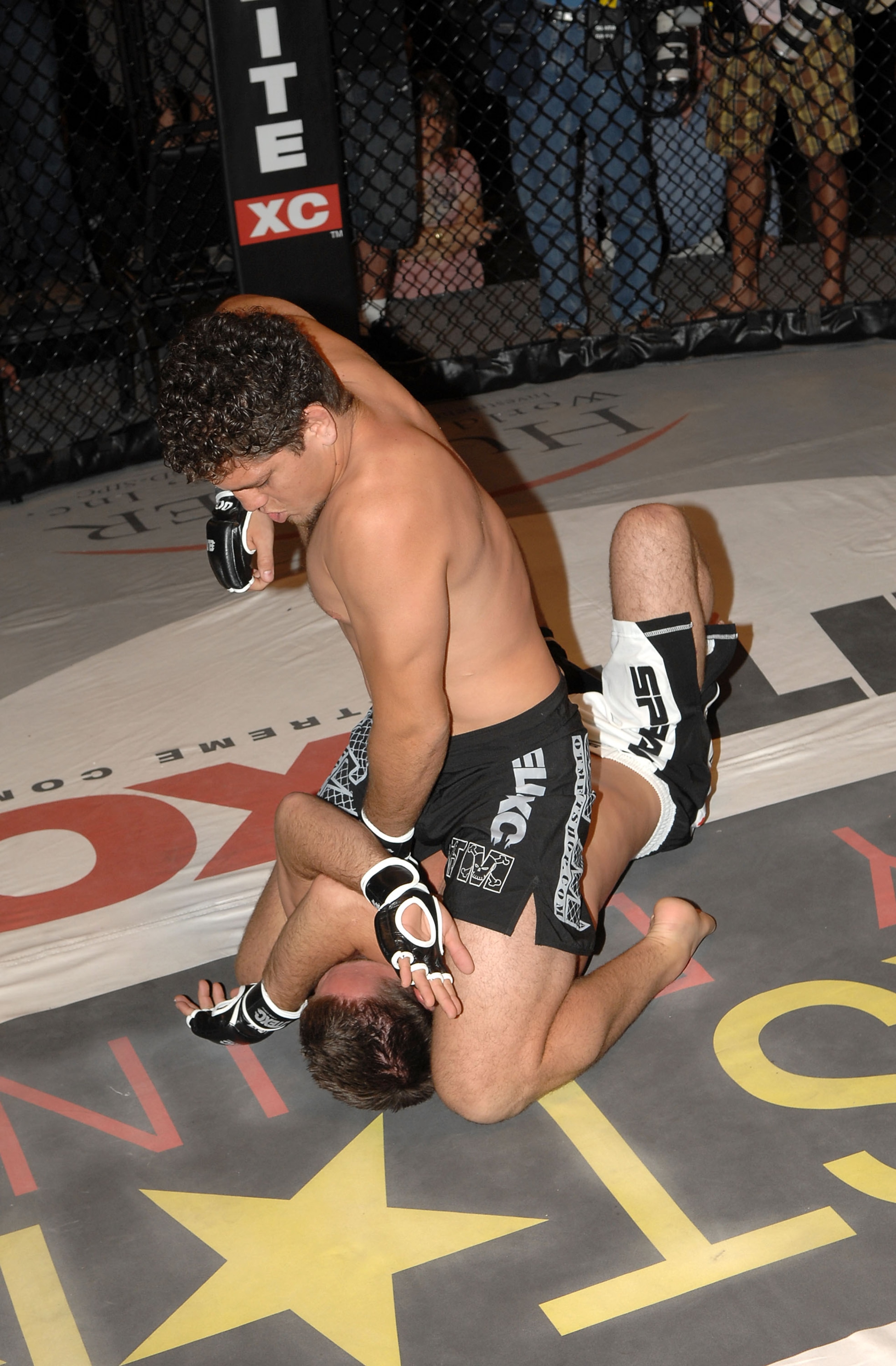 STUDIO CITY, CA - MAY 19:  MMA fighters Jake Shields (bottom) and Nick Diaz demonstrate MMA fighting techniques at CBS's 'Elite XC Saturday Night Fights' Press Conference at CBS Radford Studios on May 19, 2008 in Studio City, California.  (Photo by Stephe