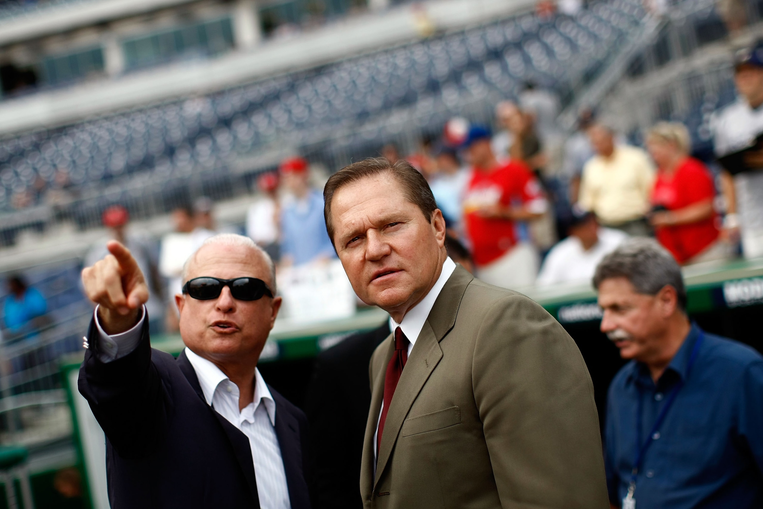 WASHINGTON - AUGUST 21:  Sports agent Scott Boras (R) talks with Washington Nationals principal owner Mark Lerner (L) during pregame warmups at Nationals Park August 21, 2009 in Washington, DC. Boras represents Stephen Strasburg, a right handed pitcher fr