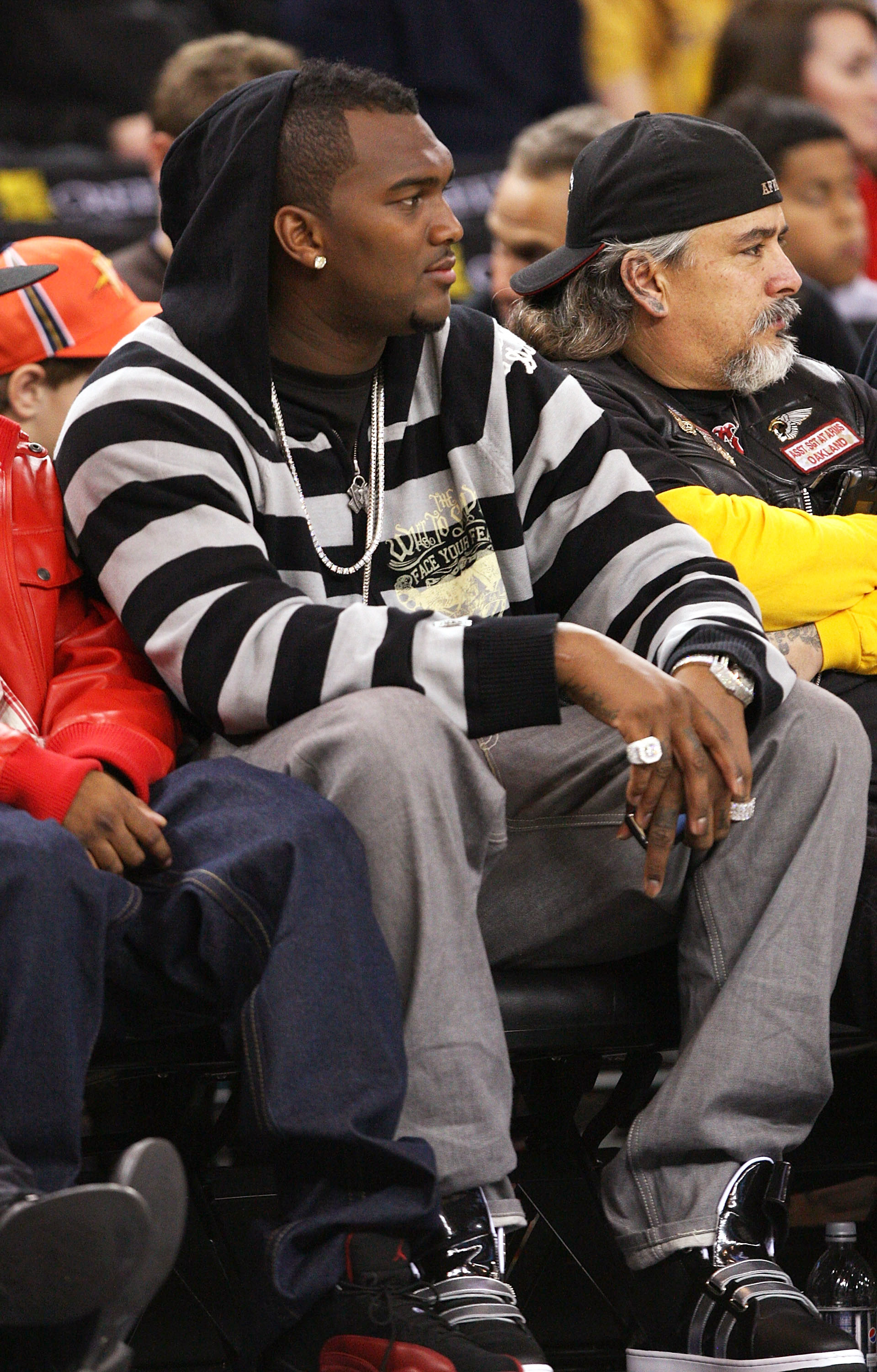 OAKLAND, CA - DECEMBER 28:  Quarterback of the Oakland Raider JaMarcus Russell looks on during the Boston Celtics and the Golden State Warriors NBA game at Oracle Arena on December 28, 2009 in Oakland, California. NOTE TO USER: User expressly acknowledges