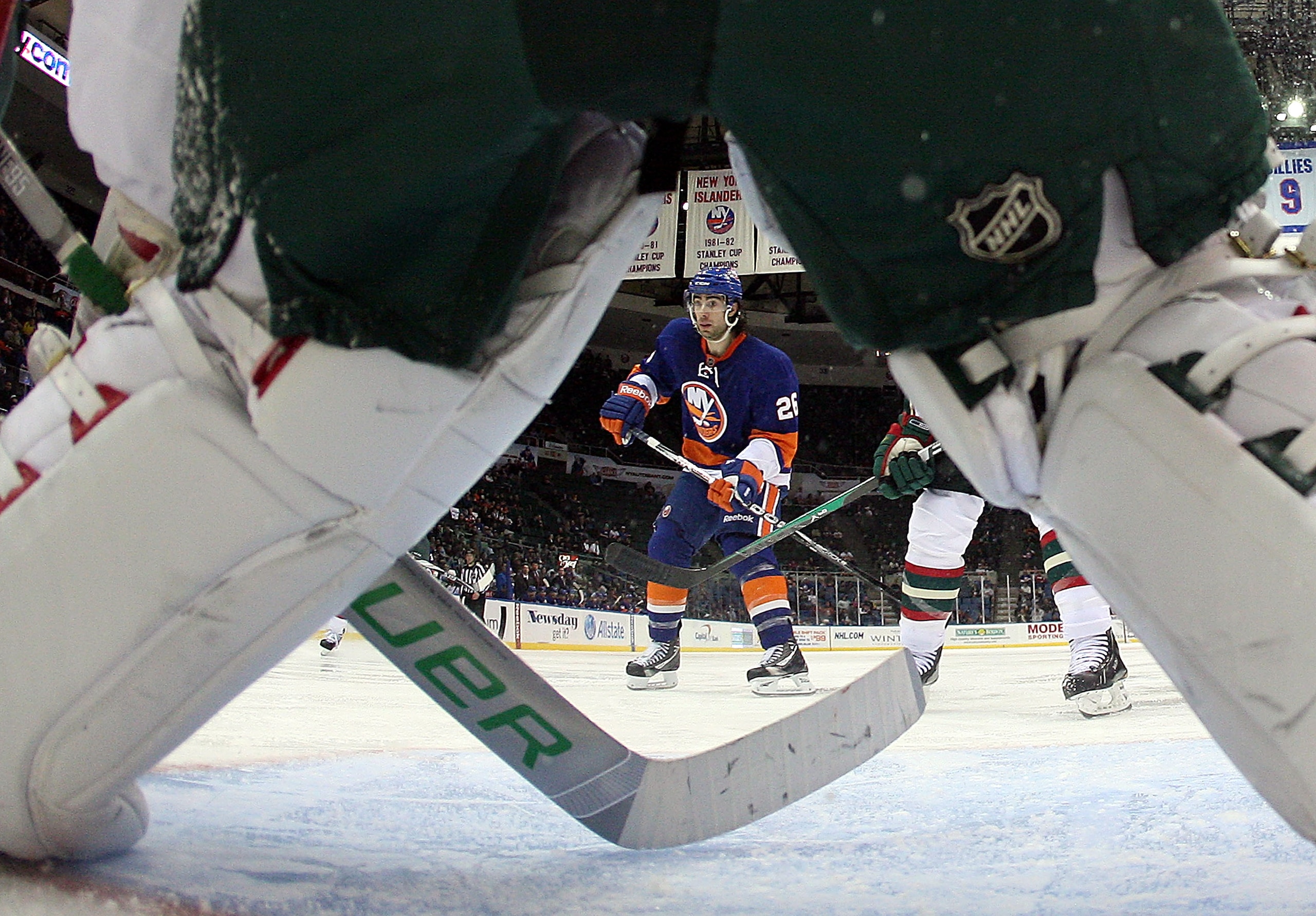 UNIONDALE, NY - MARCH 02: Matt Moulson #26 of the New York Islanders skates against Niklas Backstrom #32 of the Minnesota Wild at the Nassau Coliseum on March 2, 2011 in Uniondale, New York. The Islanders defeated the Wild 4-1. (Photo by Bruce Bennett/Get UNIONDALE, NY - MARCH 02: Matt Moulson #26 of the New York Islanders skates against Niklas Backstrom #32 of the Minnesota Wild at the Nassau Coliseum on March 2, 2011 in Uniondale, New York. The Islanders defeated the Wild 4-1. (Photo by Bruce Bennett/Get