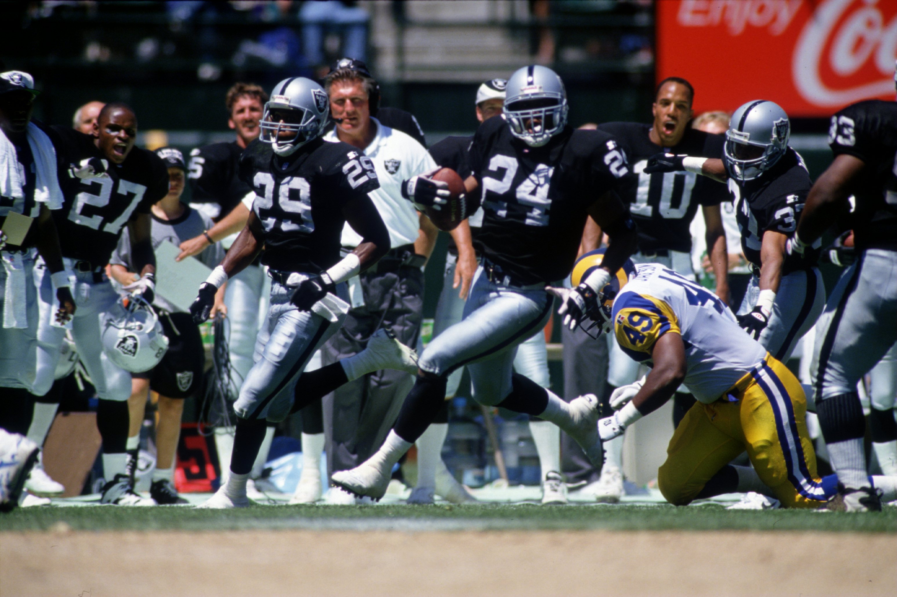 8 Nov 1995:  Defensive back Patrick Bates #24 of the Los Angeles Raiders carries the ball after intercepting a pass during the Raiders 27-22 win over the Los Angeles Rams at Memorial Coliseum in Los Angeles, California. Mandatory Credit: Otto Greule/ALLSP