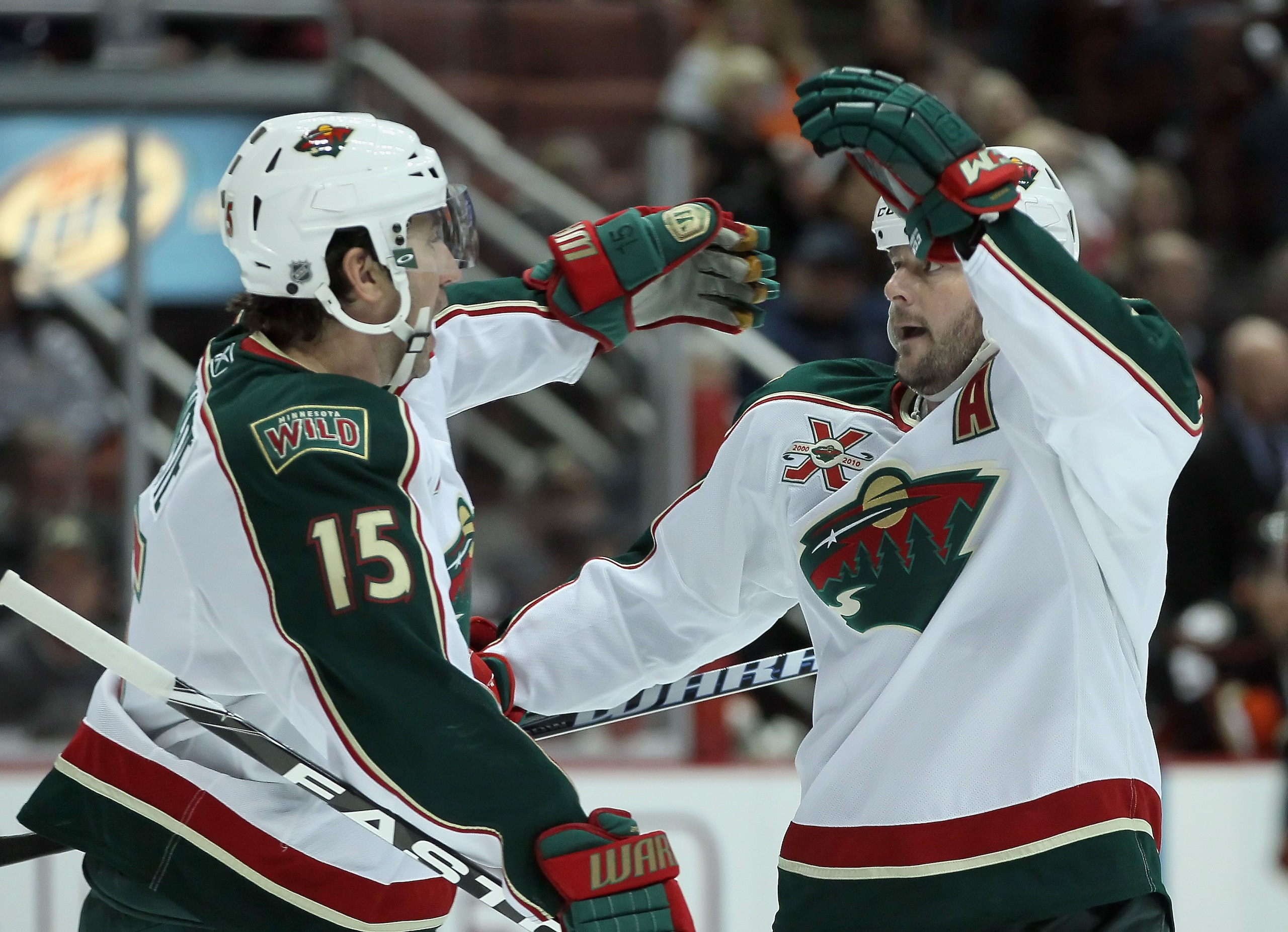 ANAHEIM, CA - FEBRUARY 25: Andrew Brunett #15 and John Madden #11 of the Minnesota Wild celebrate Madden's first period goal against the Anaheim Ducks at Honda Center on February 25, 2011 in Anaheim, California. (Photo by Jeff Gross/Getty Images) ANAHEIM, CA - FEBRUARY 25: Andrew Brunett #15 and John Madden #11 of the Minnesota Wild celebrate Madden's first period goal against the Anaheim Ducks at Honda Center on February 25, 2011 in Anaheim, California. (Photo by Jeff Gross/Getty Images)
