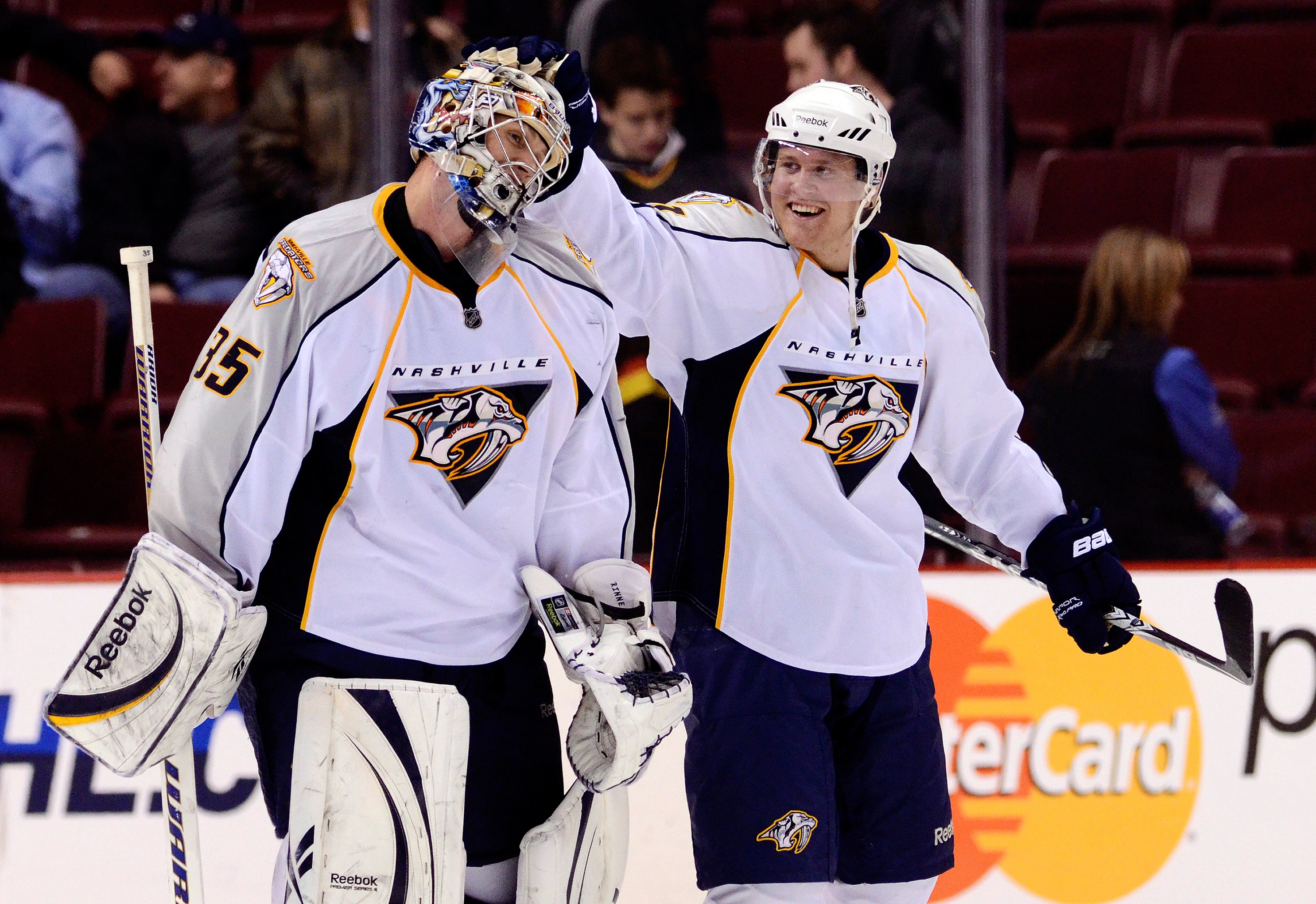 VANCOUVER, CANADA - MARCH 3: Goalie Pekka Rinne #35 of the Nashville Predators is congratulated by Patric Hornqvist #27 after defeating the Vancouver Canucks 3-0 in NHL action on March 03, 2011 at Rogers Arena in Vancouver, British Columbia, Canada.  (Pho