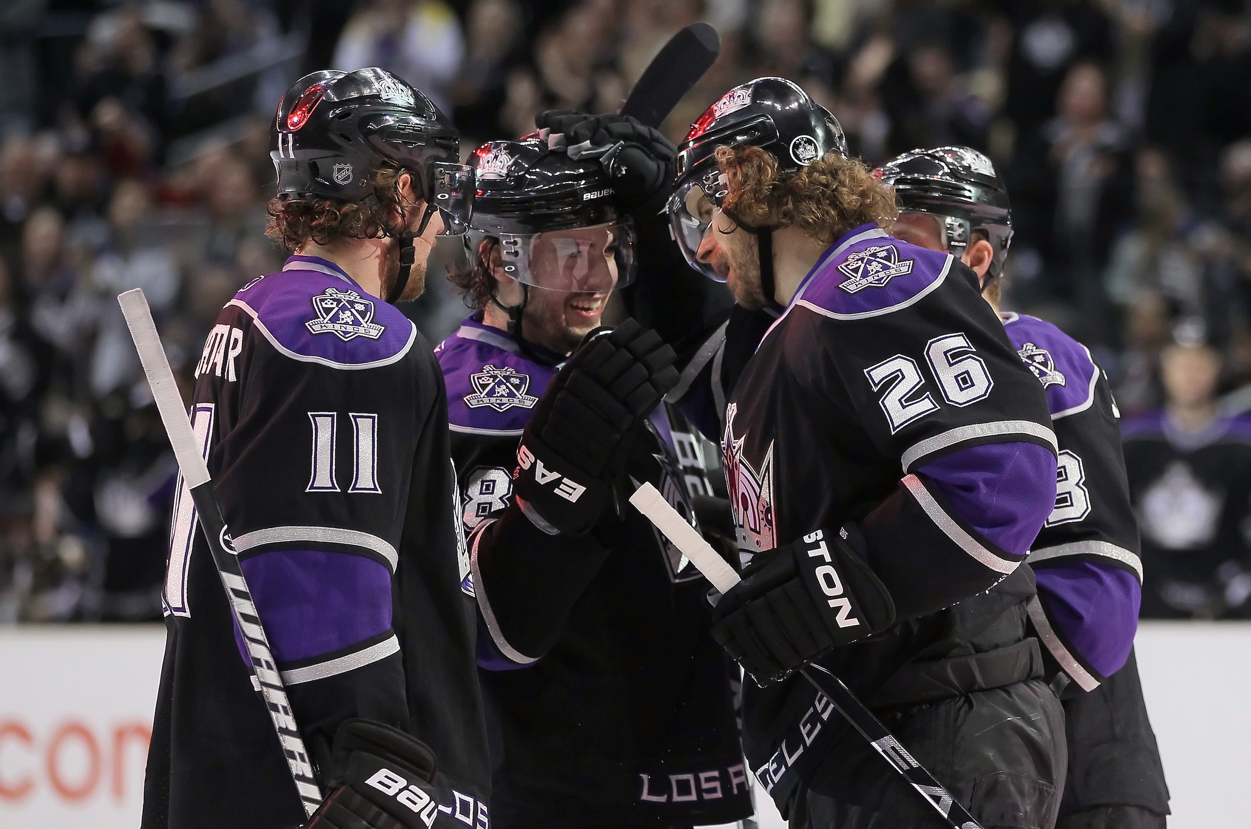 LOS ANGELES, CA - FEBRUARY 26: (L-R) Anze Kopitar #11, Drew Doughty #8 and Michal Handzus #26 of the Los Angeles Kings celebrate Doughty's second period goal against the Colorado Avalanche at Staples Center on February 26, 2011 in Los Angeles, California LOS ANGELES, CA - FEBRUARY 26: (L-R) Anze Kopitar #11, Drew Doughty #8 and Michal Handzus #26 of the Los Angeles Kings celebrate Doughty's second period goal against the Colorado Avalanche at Staples Center on February 26, 2011 in Los Angeles, California