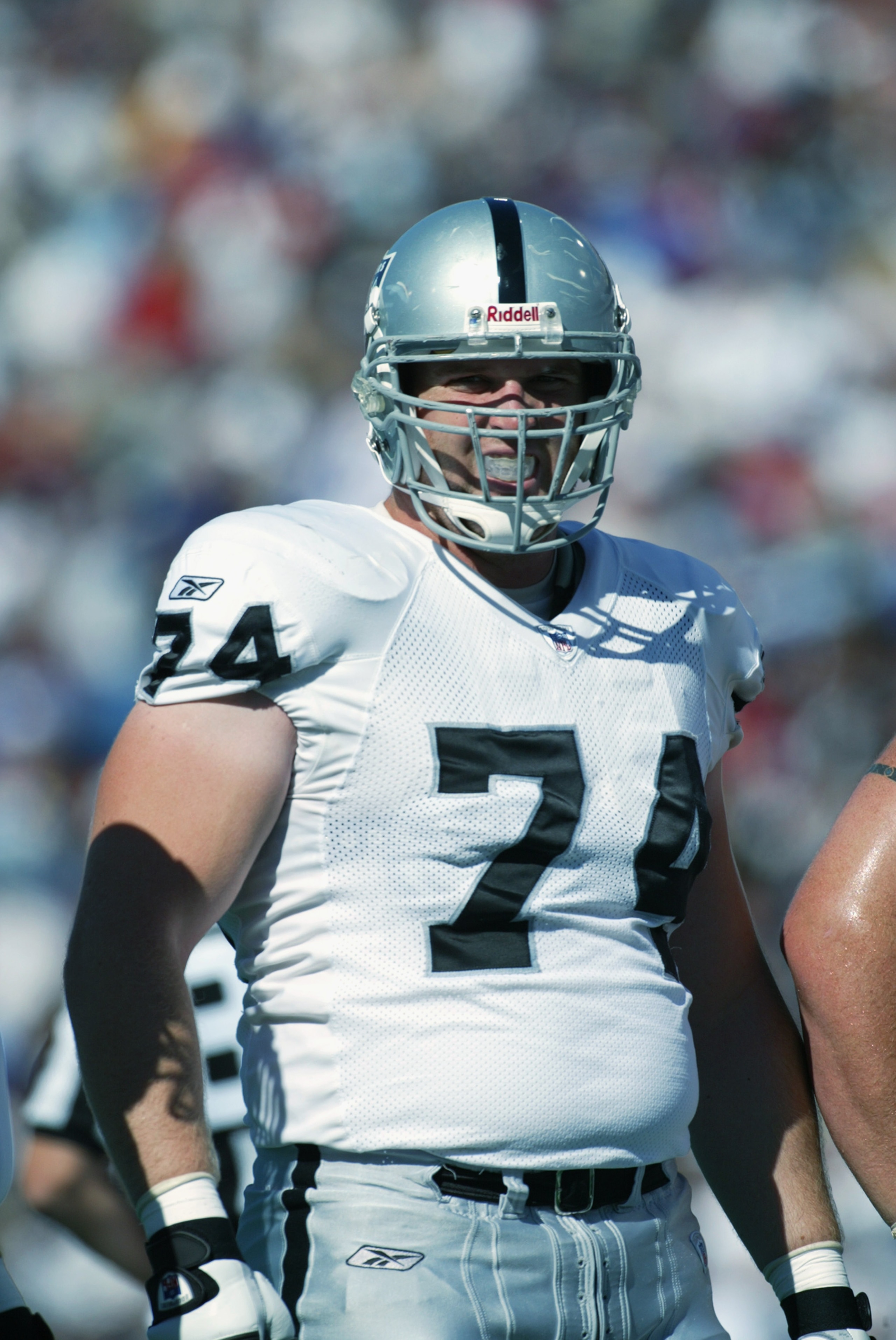 ORCHARD PARK, NY - October 6:  Guard Matt Stinchcomb #74 of the Oakland Raiders warms up before the NFL game against the Buffalo Bills on October 6, 2002 at Ralph Wilson Stadium in Orchard Park, New York. The Raiders won 49-31.  (Photo by Rick Stewart/Get