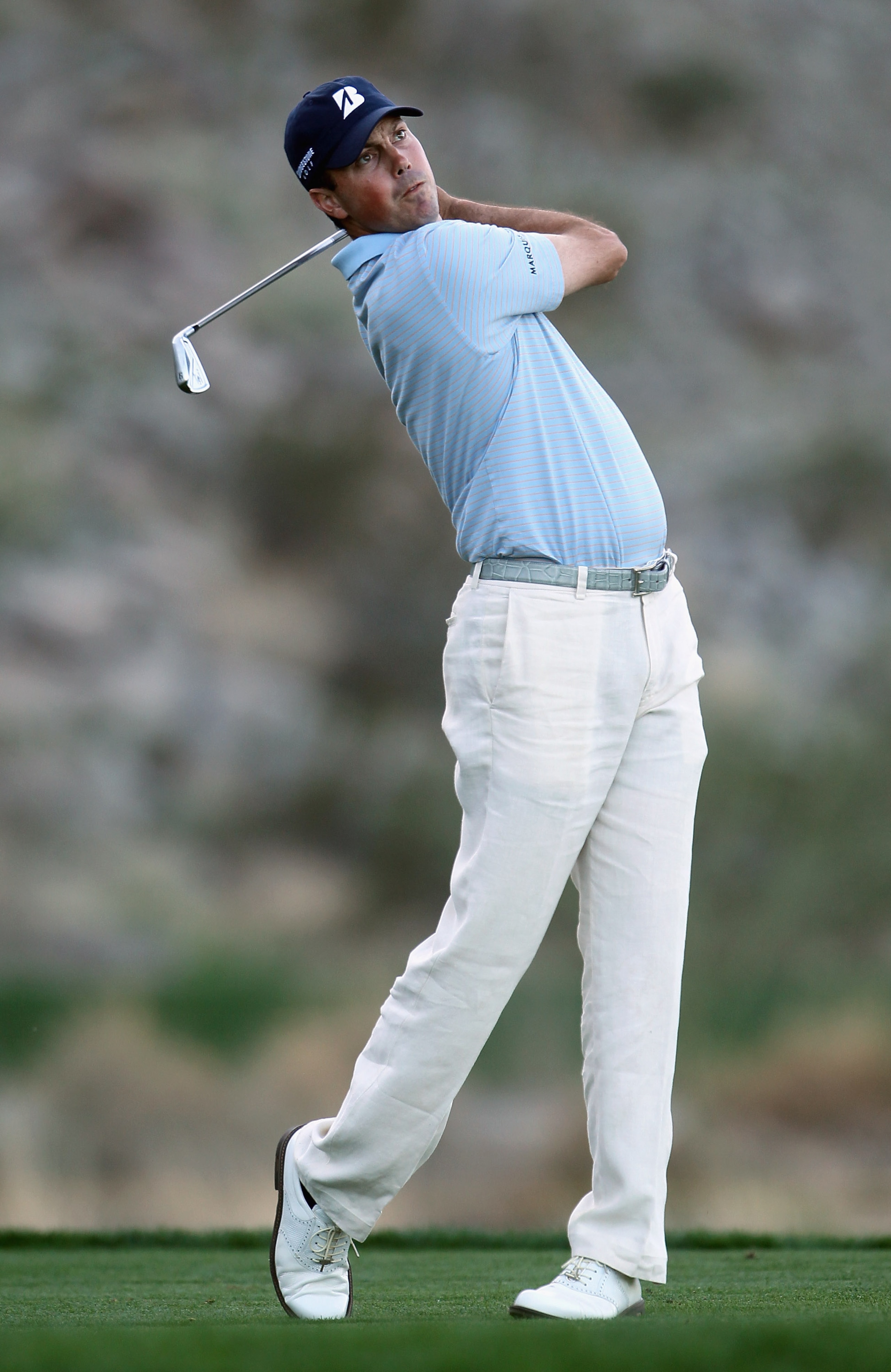 LA QUINTA, CA - JANUARY 19:  Matt Kuchar hits a tee shot on the eighth hole during the first round of the Bob Hope Classic at the Silver Rock Resort on January 19, 2011 in La Quinta, California.  (Photo by Jeff Gross/Getty Images)