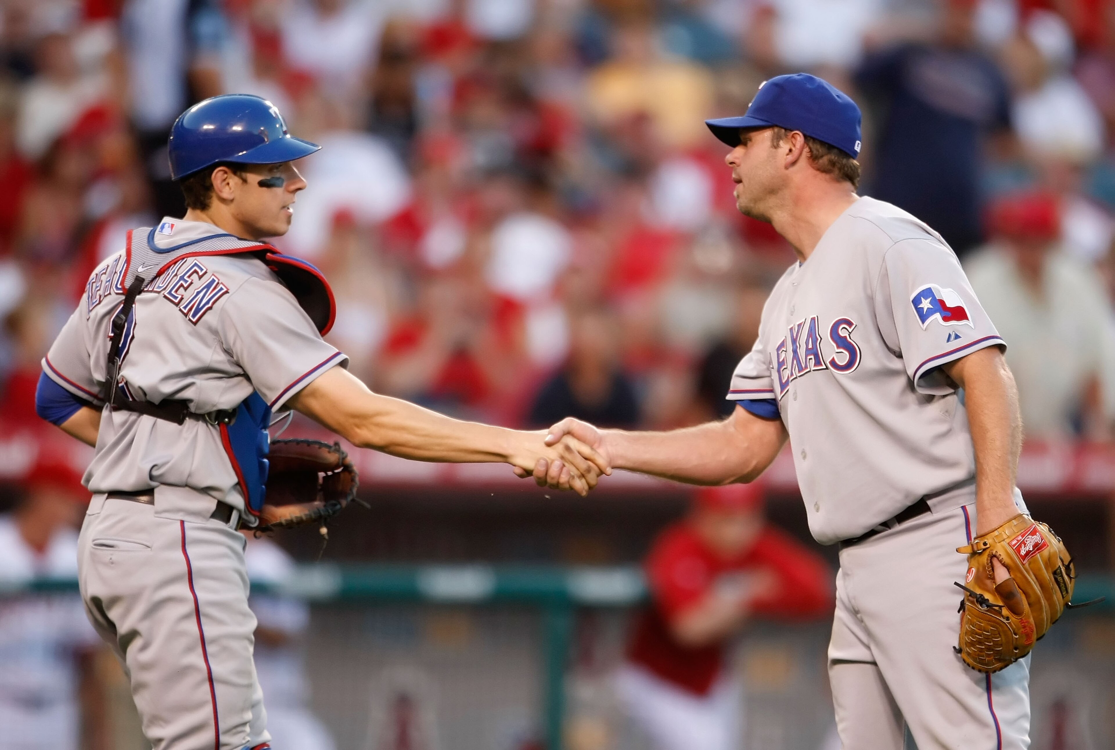 ANAHEIM, CA - OCTOBER 01: Taylor Teagarden (L) #2 and Kevin Millwood #33 of the Texas Rangers congratulate one another following their victory over the Los Angeles Angels of Anaheim at Angel Stadium on October 1, 2009 in Anaheim, California. The Rangers ANAHEIM, CA - OCTOBER 01: Taylor Teagarden (L) #2 and Kevin Millwood #33 of the Texas Rangers congratulate one another following their victory over the Los Angeles Angels of Anaheim at Angel Stadium on October 1, 2009 in Anaheim, California. The Rangers