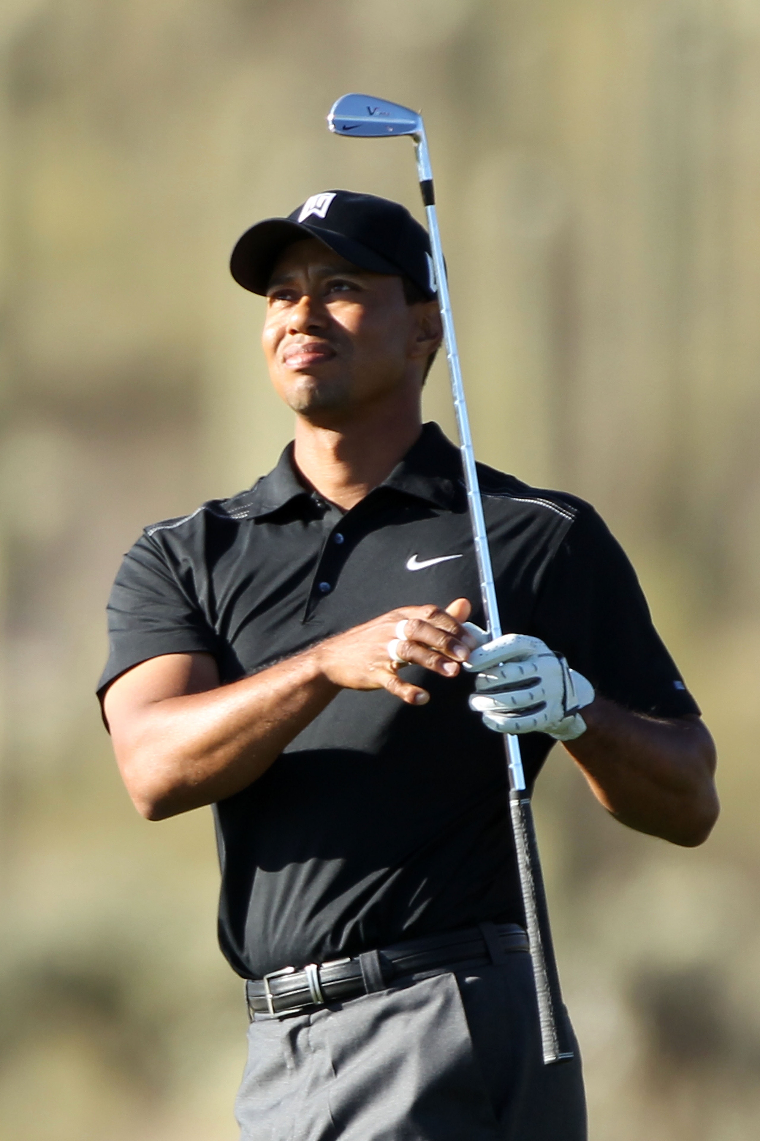 MARANA, AZ - FEBRUARY 23:  Tiger Woods looks on from the 17th hole during the first round of the Accenture Match Play Championship at the Ritz-Carlton Golf Club on February 23, 2011 in Marana, Arizona.  (Photo by Andy Lyons/Getty Images)