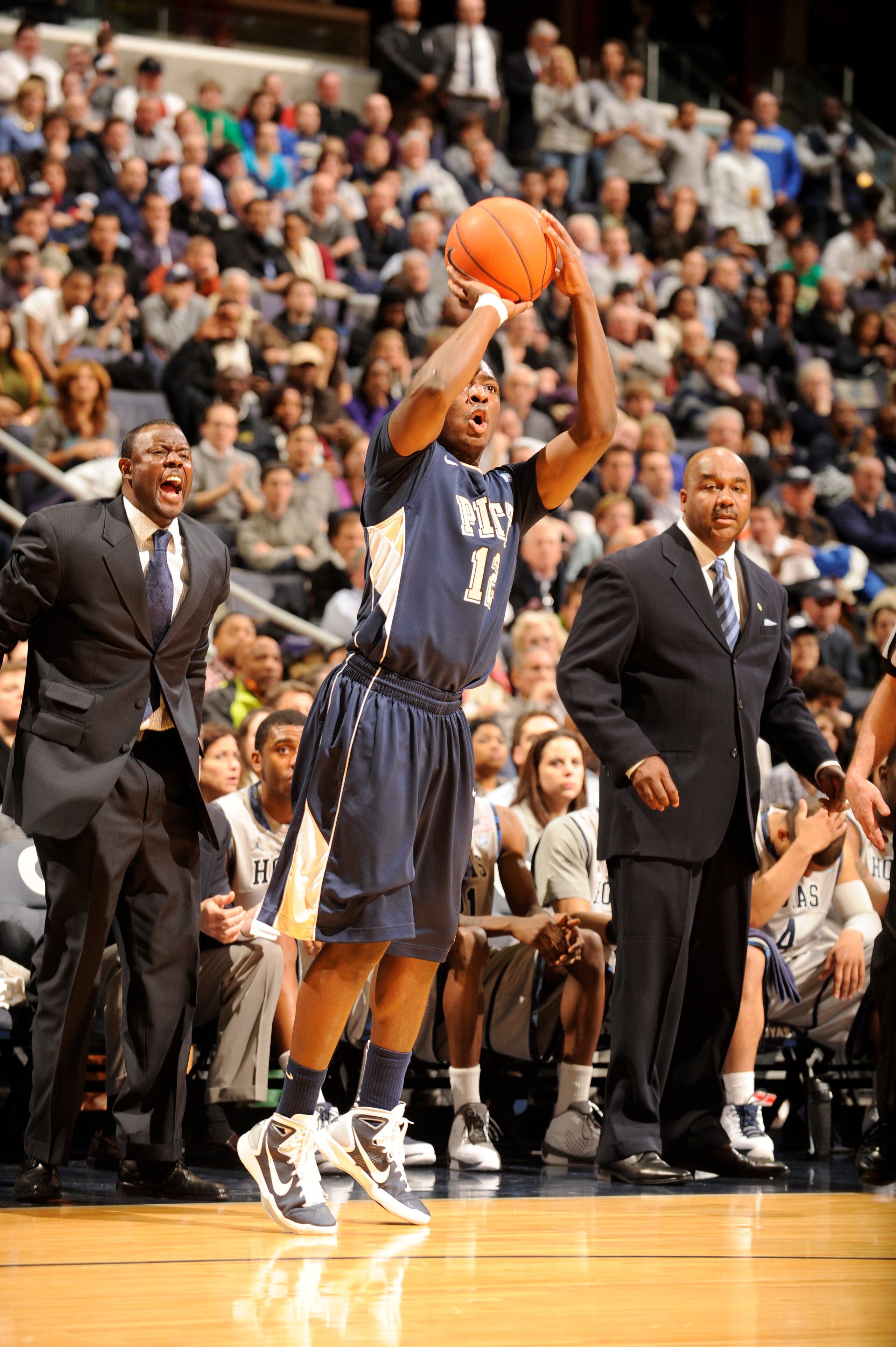 WASHINGTON, DC- JANUARY 12:  Ashton Gibbs #12 of the Pittsburgh Panthers takes a jump shot during a college basketball game against the Georgetown Hoyas on January 12, 2011 at the Verizon Center in Washington, DC.  The Panthers won 72-57.  (Photo by Mitch