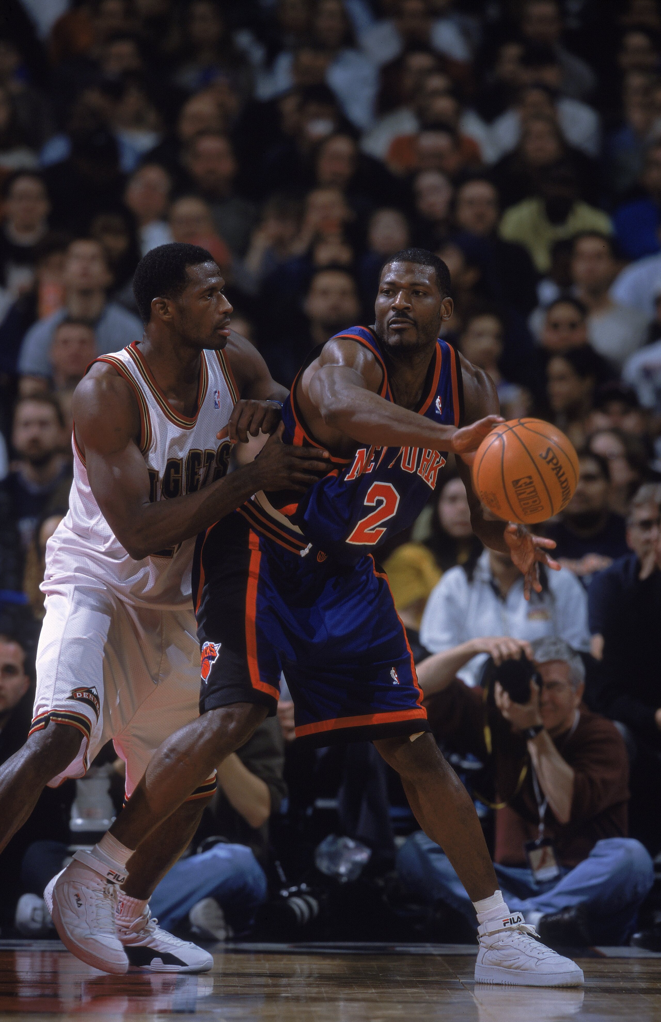 13 Feb 2001:  Larry Johnson #2 of the New York Knicks passes the ball during the game against the Denver Nuggets at the Pepsi Center in Denver, Colorado.  The Nuggets defeated the Knicks 96-77.   NOTE TO USER: It is expressly understood that the only righ