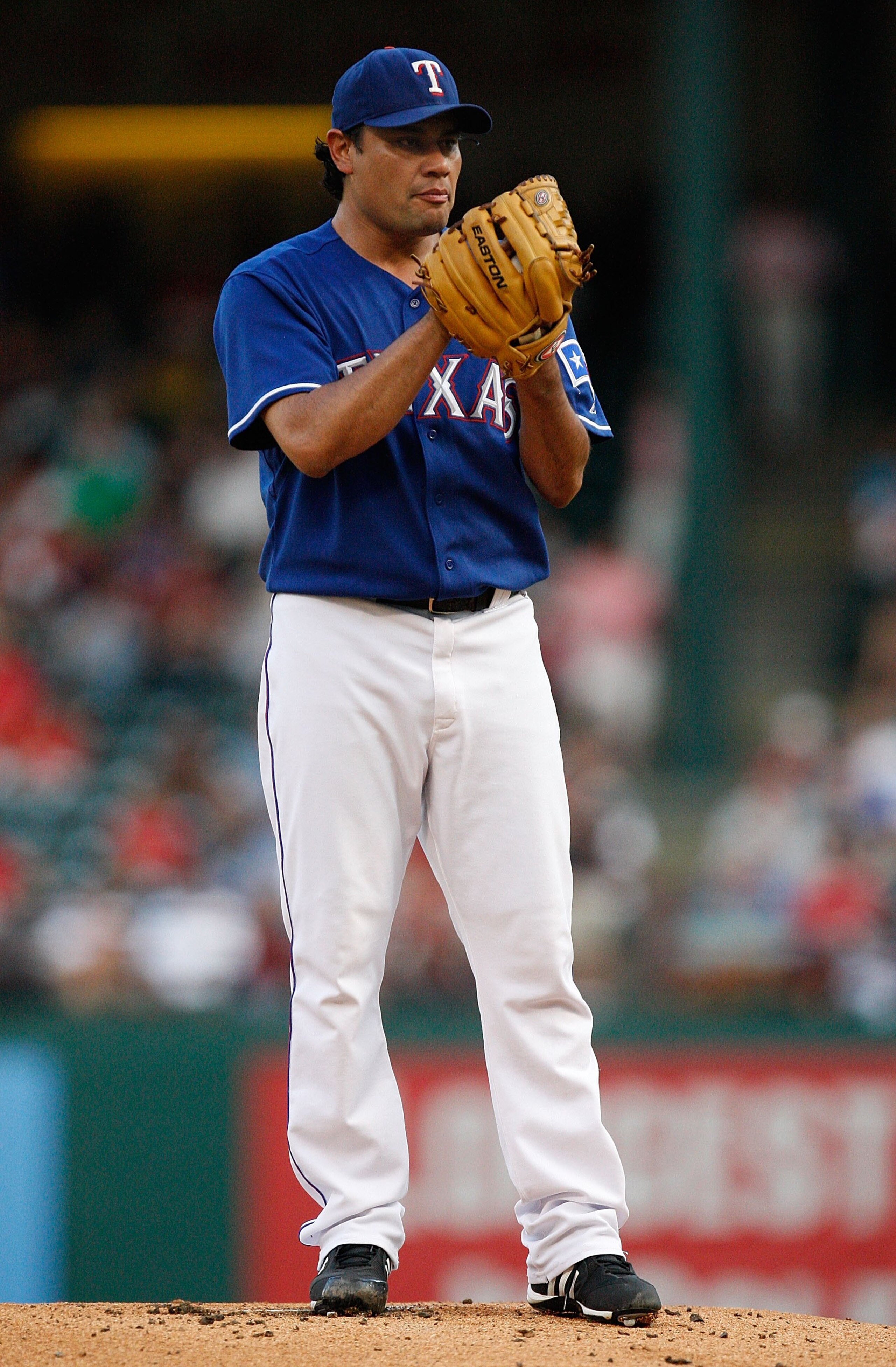ARLINGTON, TX - JULY 17:  Pitcher Vicente Padilla #44 of the Texas Rangers throws against the Minnesota Twins on July 17, 2009 at Rangers Ballpark in Arlington, Texas.  (Photo by Ronald Martinez/Getty Images)