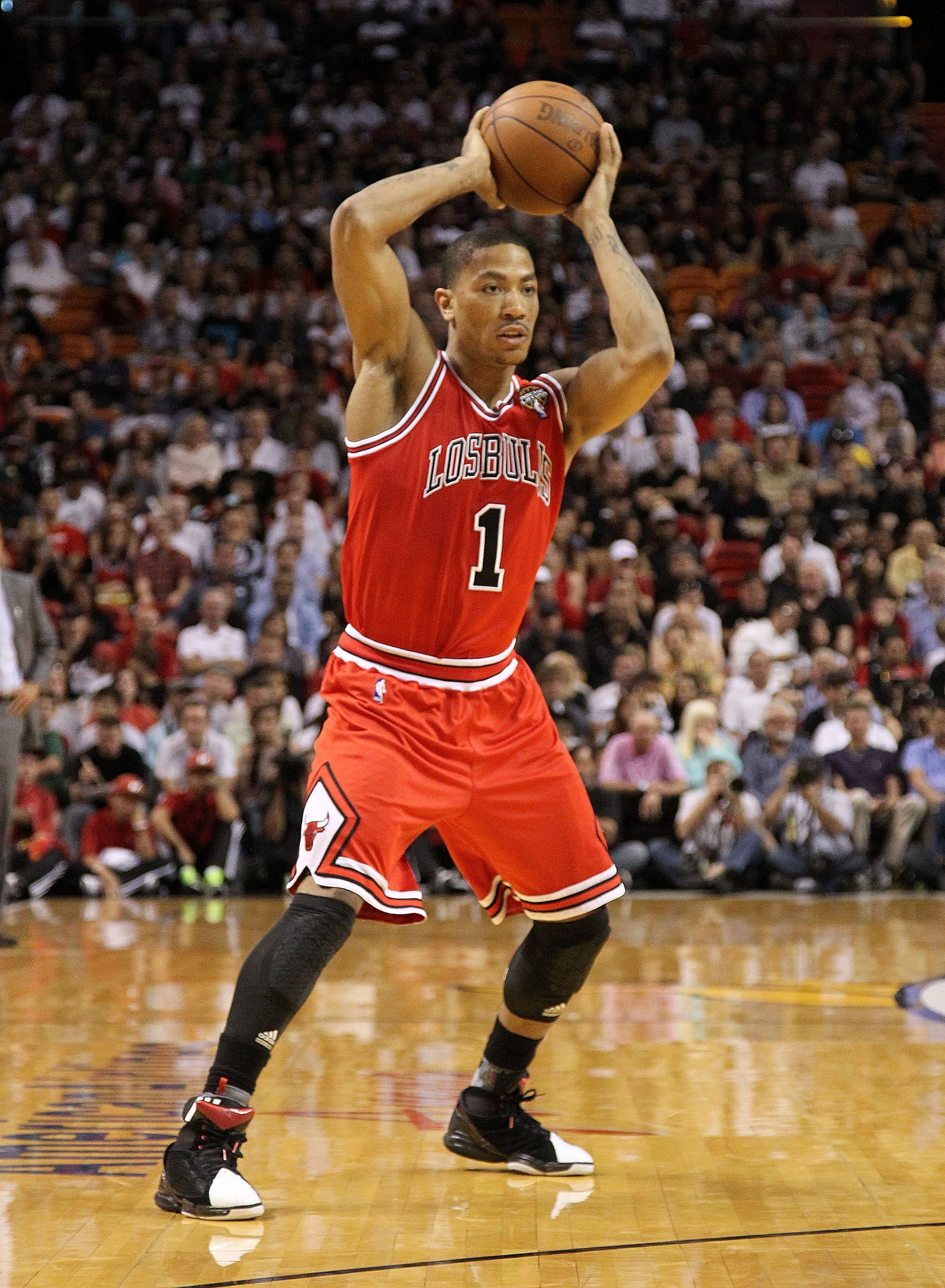 MIAMI, FL - MARCH 06: Derrick Rose #1 of the Chicago Bulls looks to pass during a game against the Miami Heat at American Airlines Arena on March 6, 2011 in Miami, Florida. NOTE TO USER: User expressly acknowledges and agrees that, by downloading and/or u