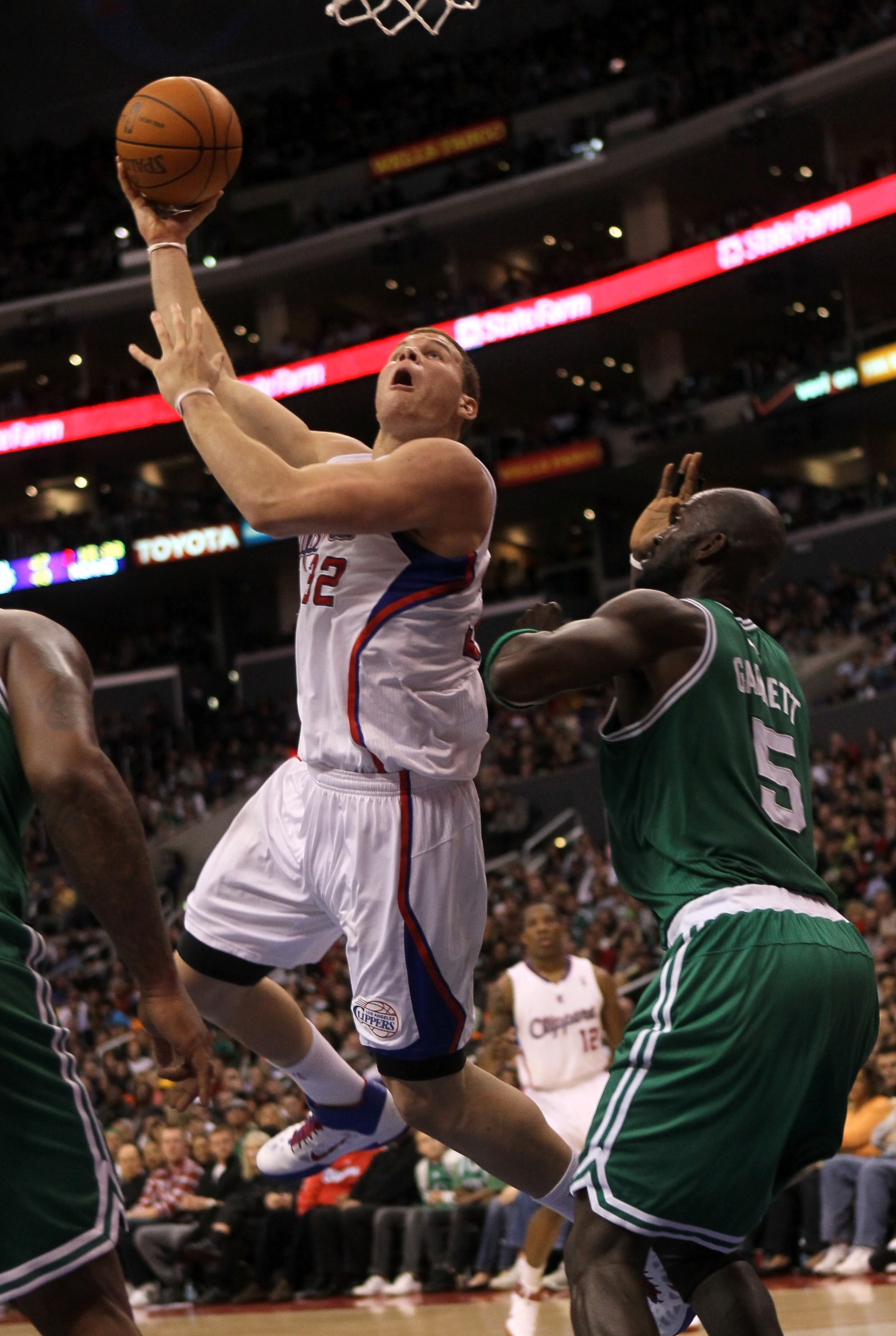 LOS ANGELES, CA - FEBRUARY 26:  Blake Griffin #32 of the Los Angeles Clippers shoots over Kevin Garnett #5 of the Boston Celtics at Staples Center on February 26, 2011  in Los Angeles, California. The Celtics won 99-92.  NOTE TO USER: User expressly ackno