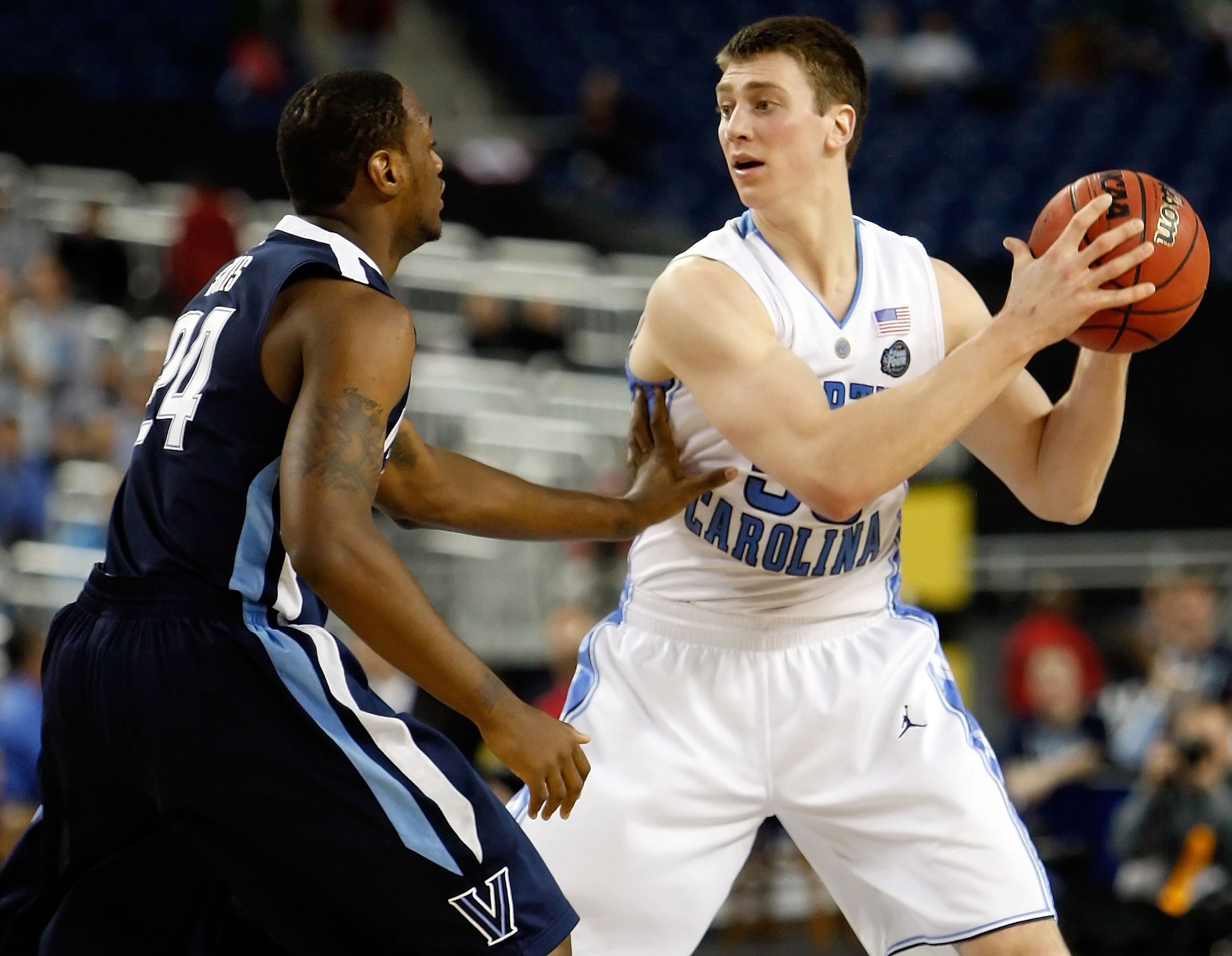 DETROIT - APRIL 04: Tyler Hansbrough #50 of the North Carolina Tar Heels looks to drive against Corey Stokes #24 of the Villanova Wildcats during the National Semifinal game of the NCAA Division I Men's Basketball Championship at Ford Field on April 4, 2 DETROIT - APRIL 04: Tyler Hansbrough #50 of the North Carolina Tar Heels looks to drive against Corey Stokes #24 of the Villanova Wildcats during the National Semifinal game of the NCAA Division I Men's Basketball Championship at Ford Field on April 4, 2