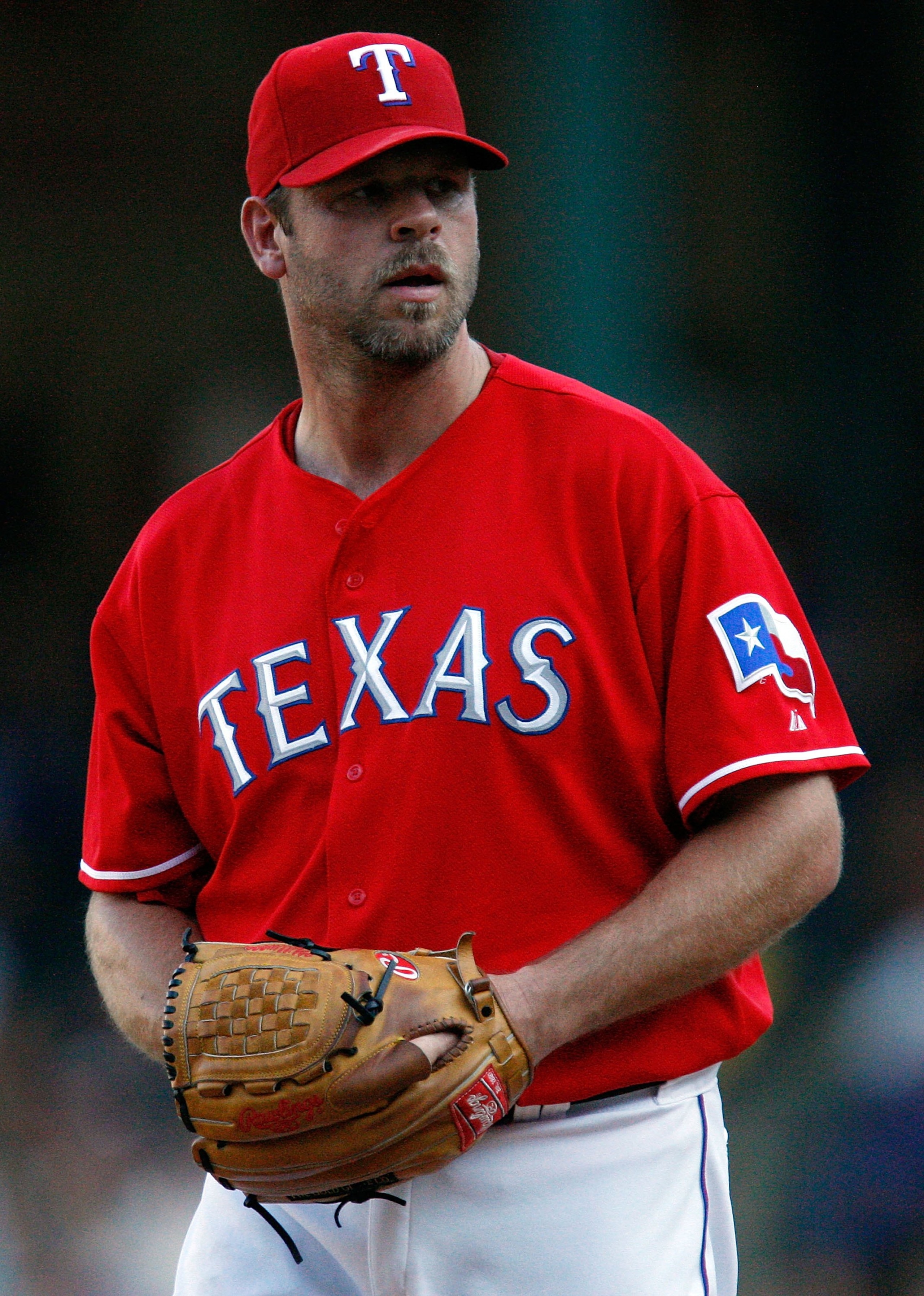 ARLINGTON, TX - JULY 01:  Pitcher Kevin Millwood #33 of the Texas Rangers throws against the Los Angeles Angels of Anaheim on July 1, 2009 at Rangers Ballpark in Arlington, Texas.  (Photo by Ronald Martinez/Getty Images)