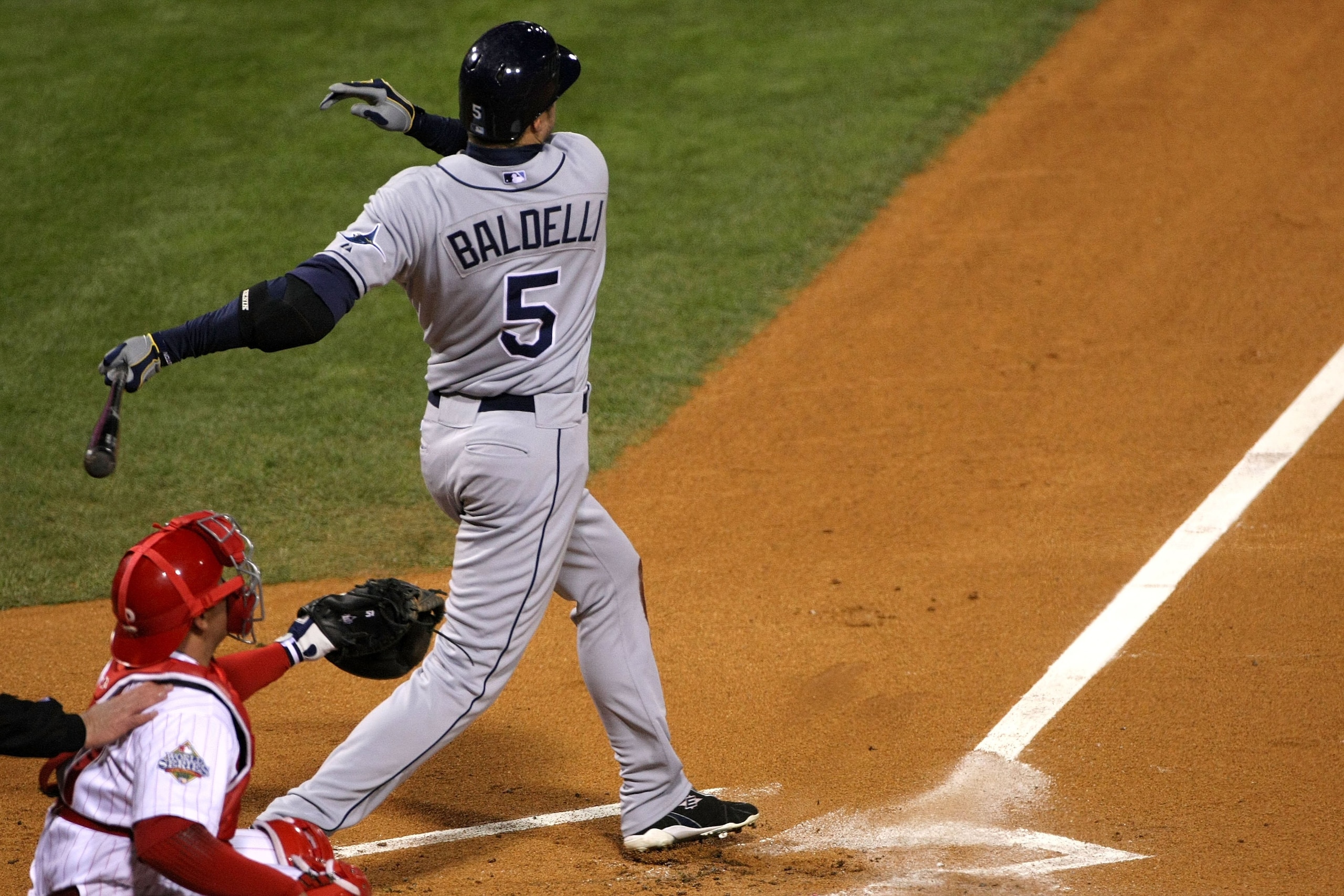 PHILADELPHIA - OCTOBER 29:  Rocco Baldelli #5 of the Tampa Bay Rays hits a solo home run in the top of the seventh inning against the Philadelphia Phillies during the continuation of game five of the 2008 MLB World Series on October 29, 2008 at Citizens B