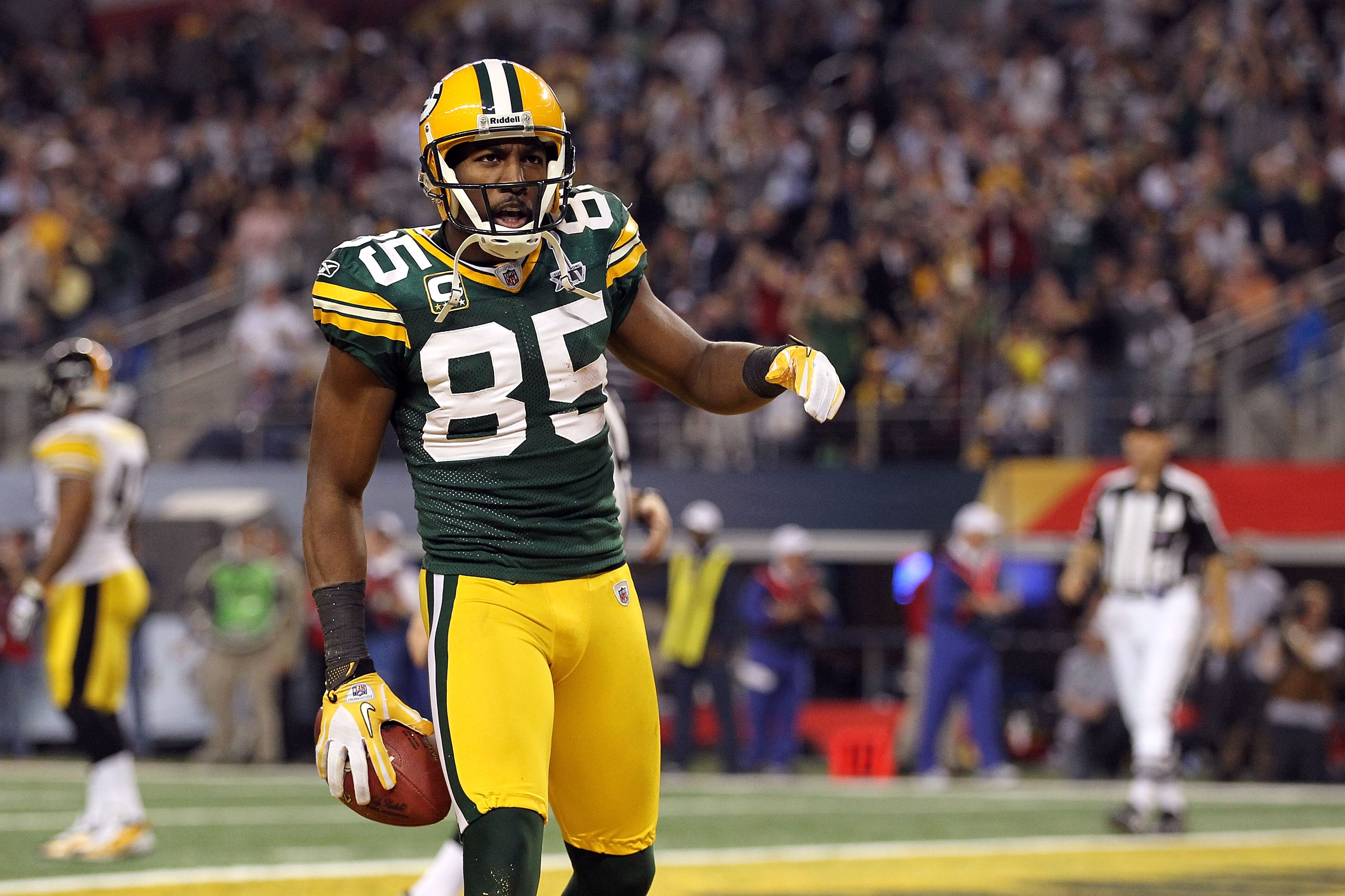 ARLINGTON, TX - FEBRUARY 06: Greg Jennings #85 of the Green Bay Packers celebrates after catching a 21 yard pass for a touchdown against the Pittsburgh Steelers during Super Bowl XLV at Cowboys Stadium on February 6, 2011 in Arlington, Texas. The Packers ARLINGTON, TX - FEBRUARY 06: Greg Jennings #85 of the Green Bay Packers celebrates after catching a 21 yard pass for a touchdown against the Pittsburgh Steelers during Super Bowl XLV at Cowboys Stadium on February 6, 2011 in Arlington, Texas. The Packers