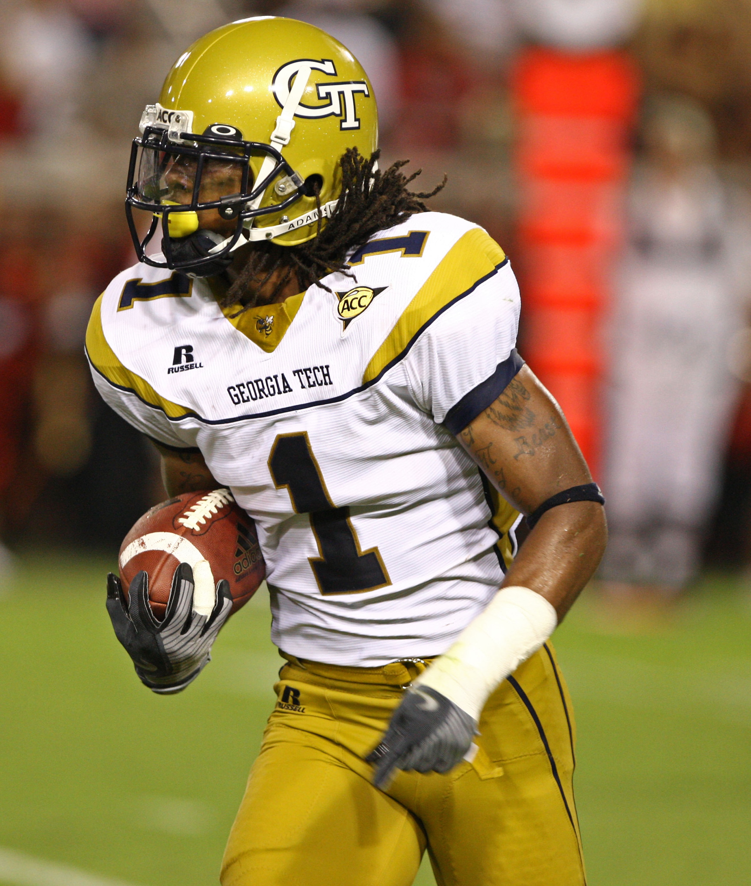 ATLANTA - AUGUST 28:  Safety Morgan Burnett #1 of the Georgia Tech Yellow Jackets returns a first half interception upfield during the game against the Jacksonville State Gamecocks at Bobby Dodd Stadium at Historic Grant Field on August 28, 2008 in Atlant