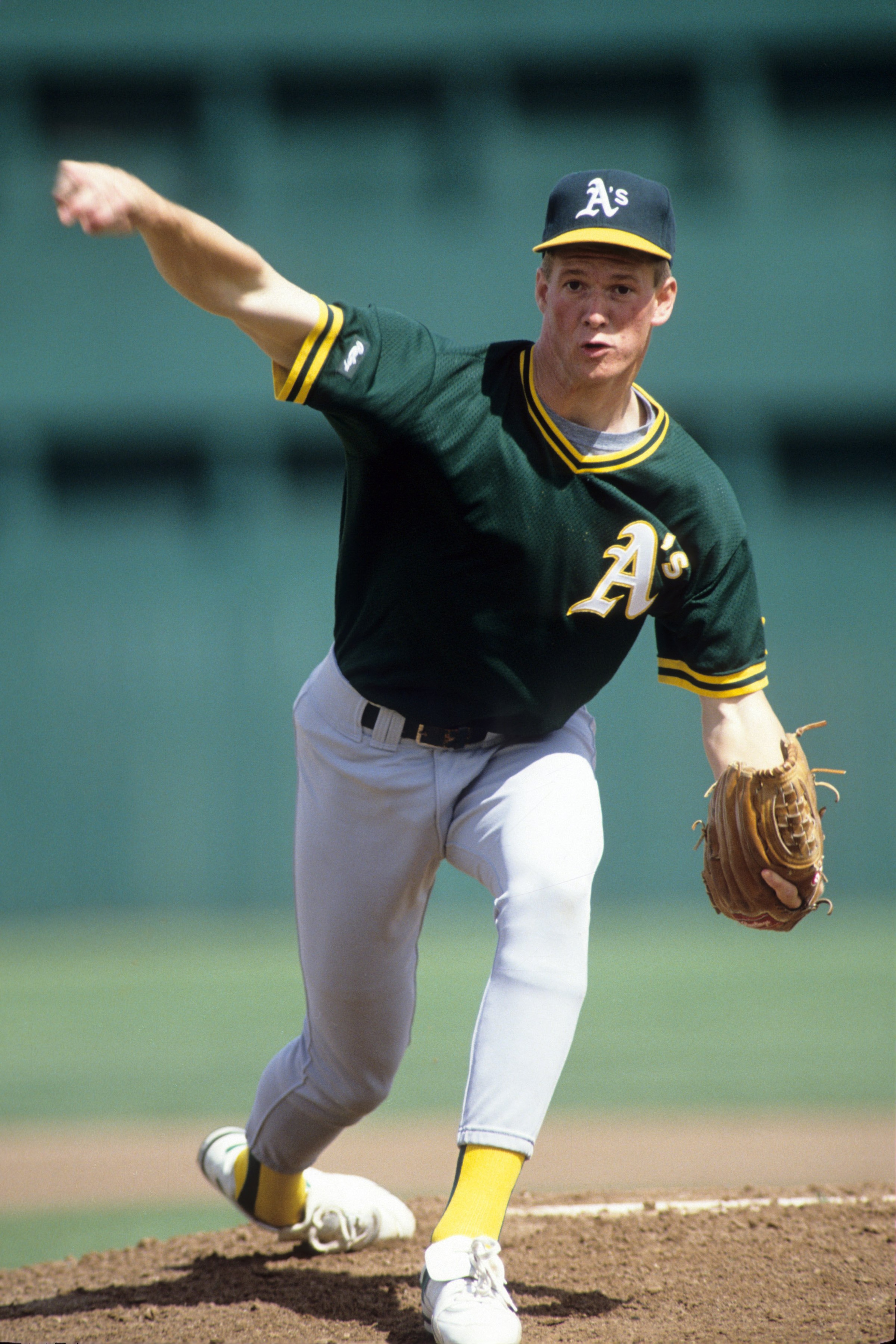 CIRCA 1991: Pitcher Todd Van Poppel #59 of the Oakland Athletics pitches during spring training circa 1991. (Photo by Otto Greule Jr./Getty Images) CIRCA 1991: Pitcher Todd Van Poppel #59 of the Oakland Athletics pitches during spring training circa 1991. (Photo by Otto Greule Jr./Getty Images)