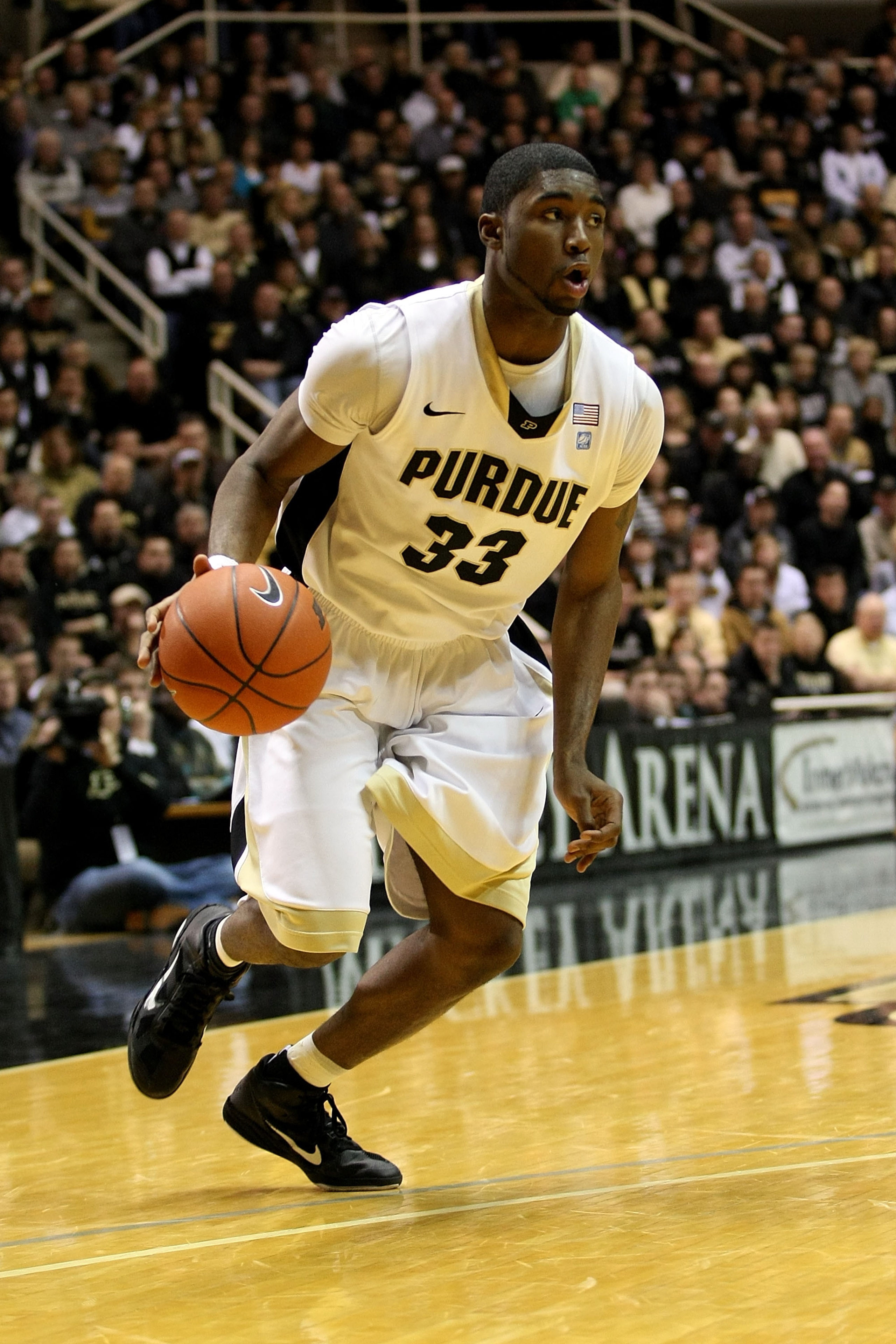 WEST LAFAYETTE, IN - JANUARY 09:  E'Twaun Moore #33 of the Purdue Boilermakers drives against the Iowa Hawkeyes at Mackey Arena on January 9, 2011 in West Lafayette, Indiana. Purdue won 75-52. (Photo by Chris Chambers/Getty Images)