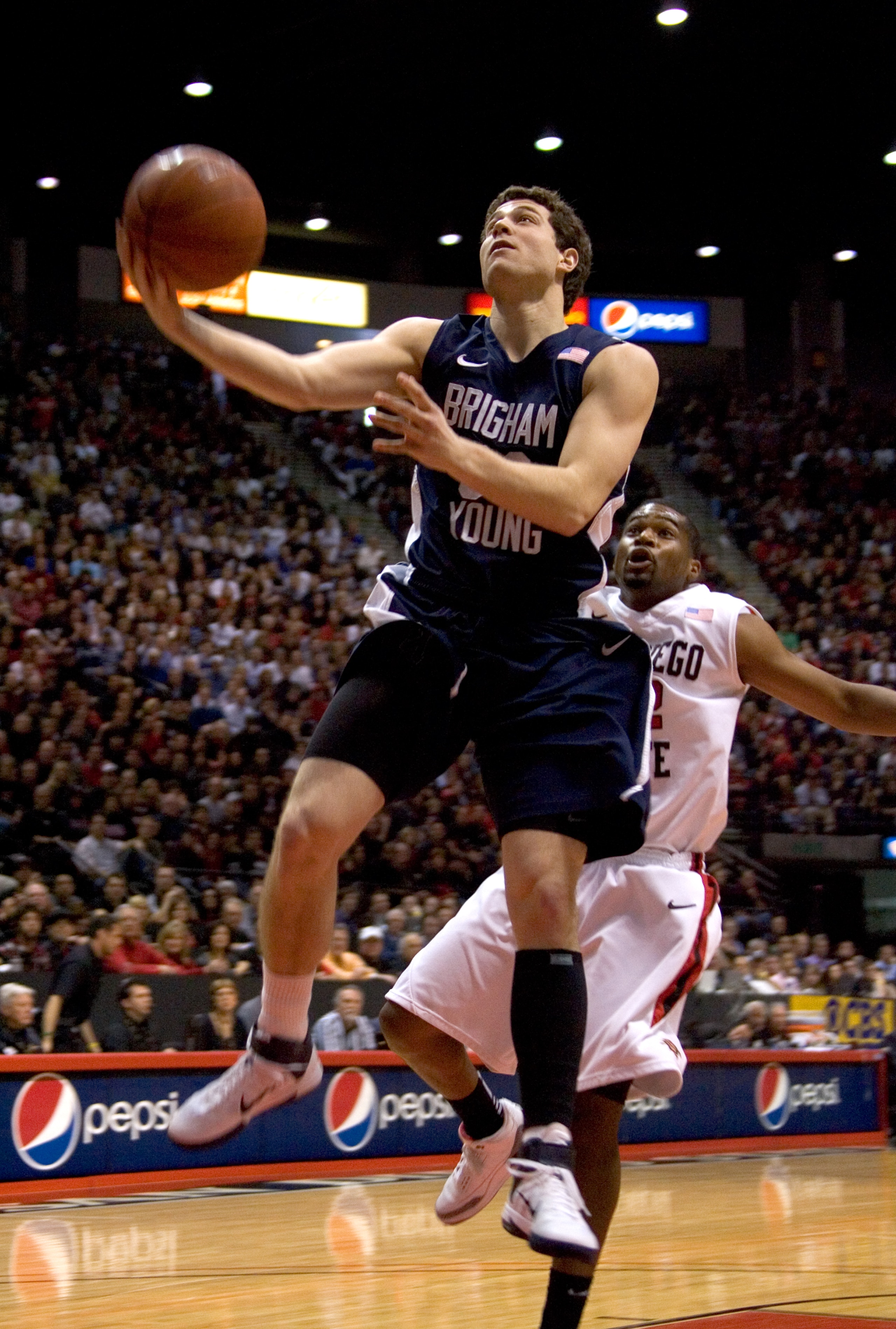 SAN DIEGO, CA - FEBRUARY 26: Jimmer Fredette #32 of the Brigham Young Cougars shoots the ball against the San Diego State Aztecs during the first half at Cox Arena on February 26, 2011 in San Diego, California. (Photo by Kent Horner/Getty Images)