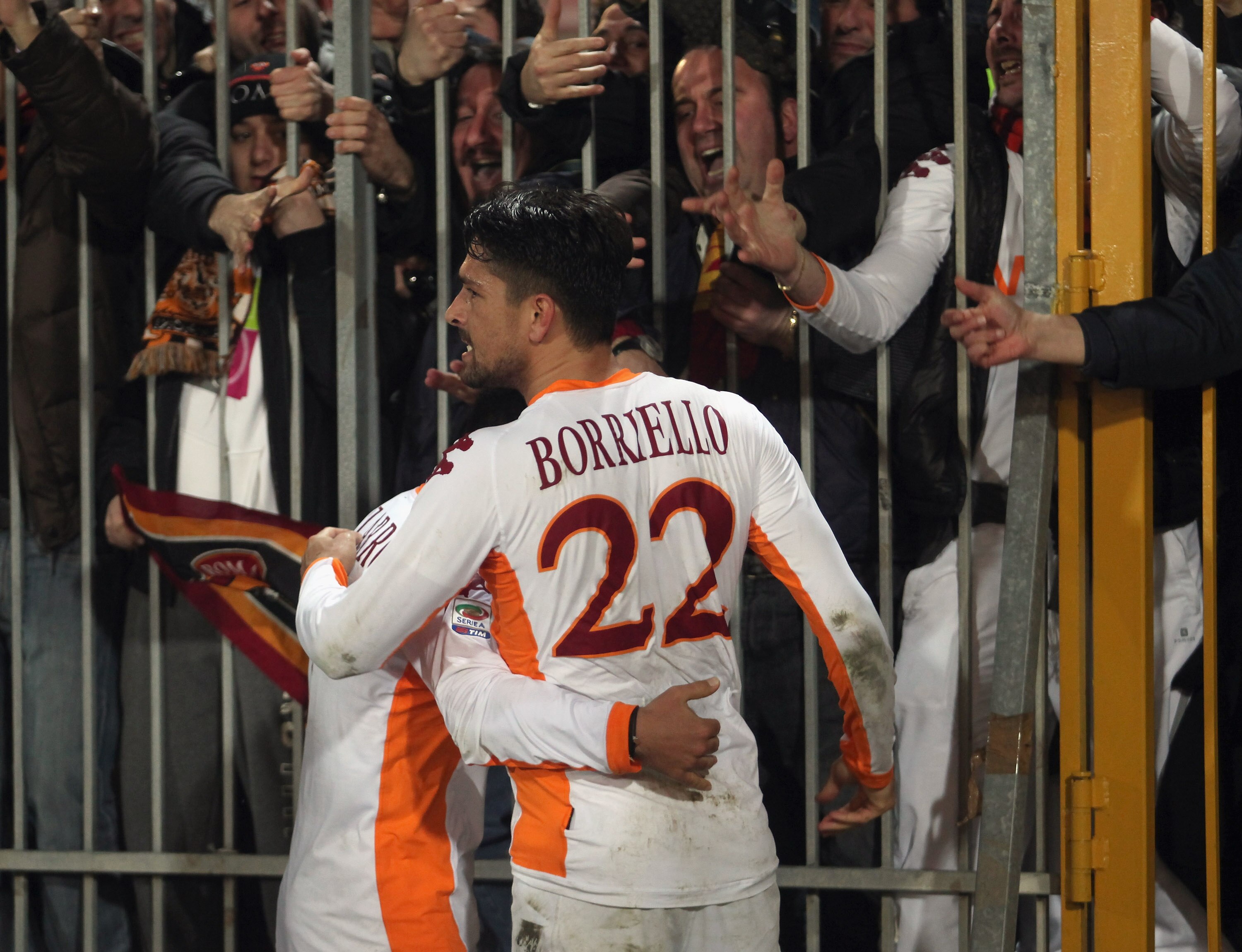 LECCE, ITALY - MARCH 04:  David Pizarro and Marco Borriello of Roma celebrate a victory goal during the Serie A match between US Lecce and AS Roma at Stadio Via del Mare on March 4, 2011 in Lecce, Italy.  (Photo by Maurizio Lagana/Getty Images)