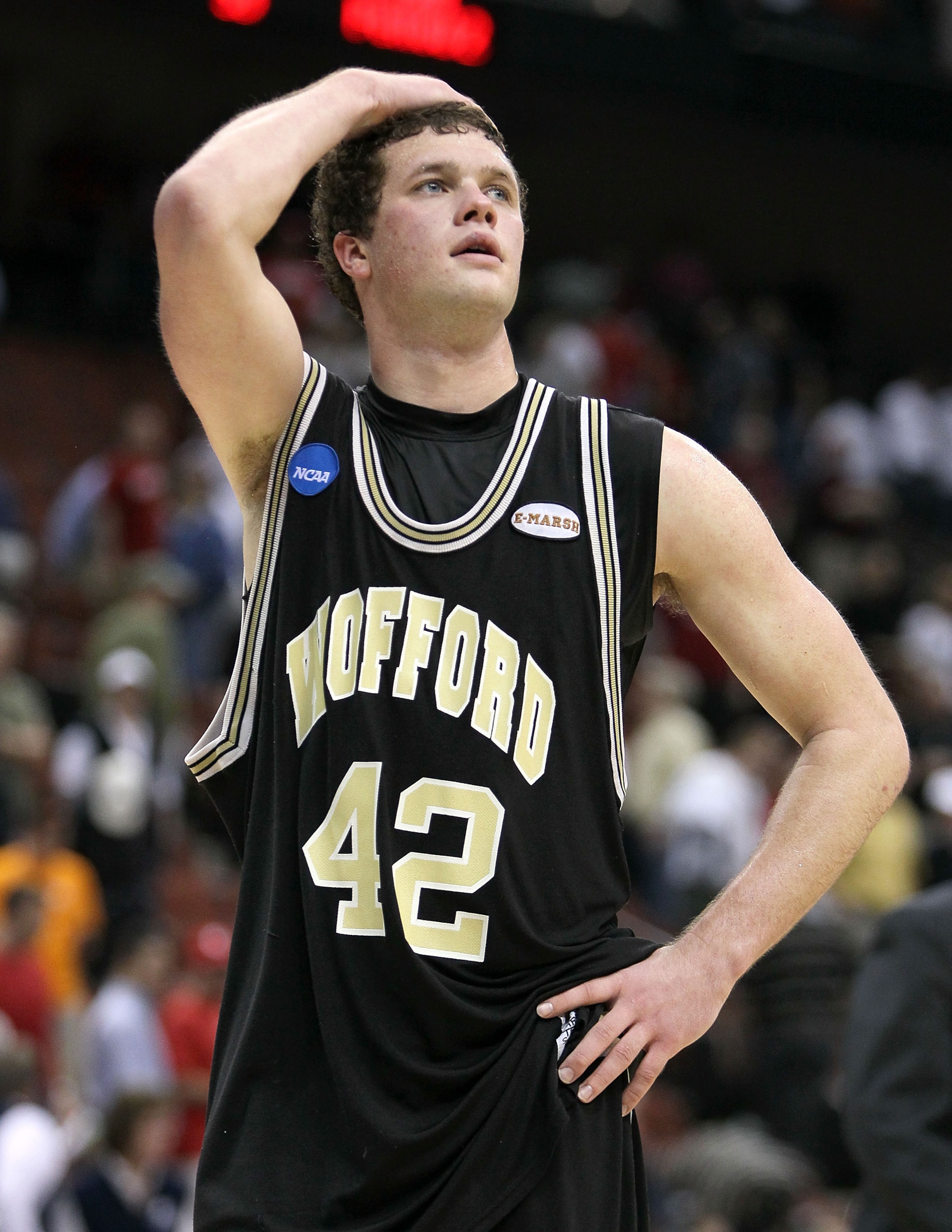 JACKSONVILLE, FL - MARCH 19:  Noah Dahlman #42  of the Wofford Terriers walks off of the court following the game against the Wisconsin Badgers in the first round of the 2010 NCAA men's basketball tournament at Jacksonville Veteran's Memorial Arena on Mar