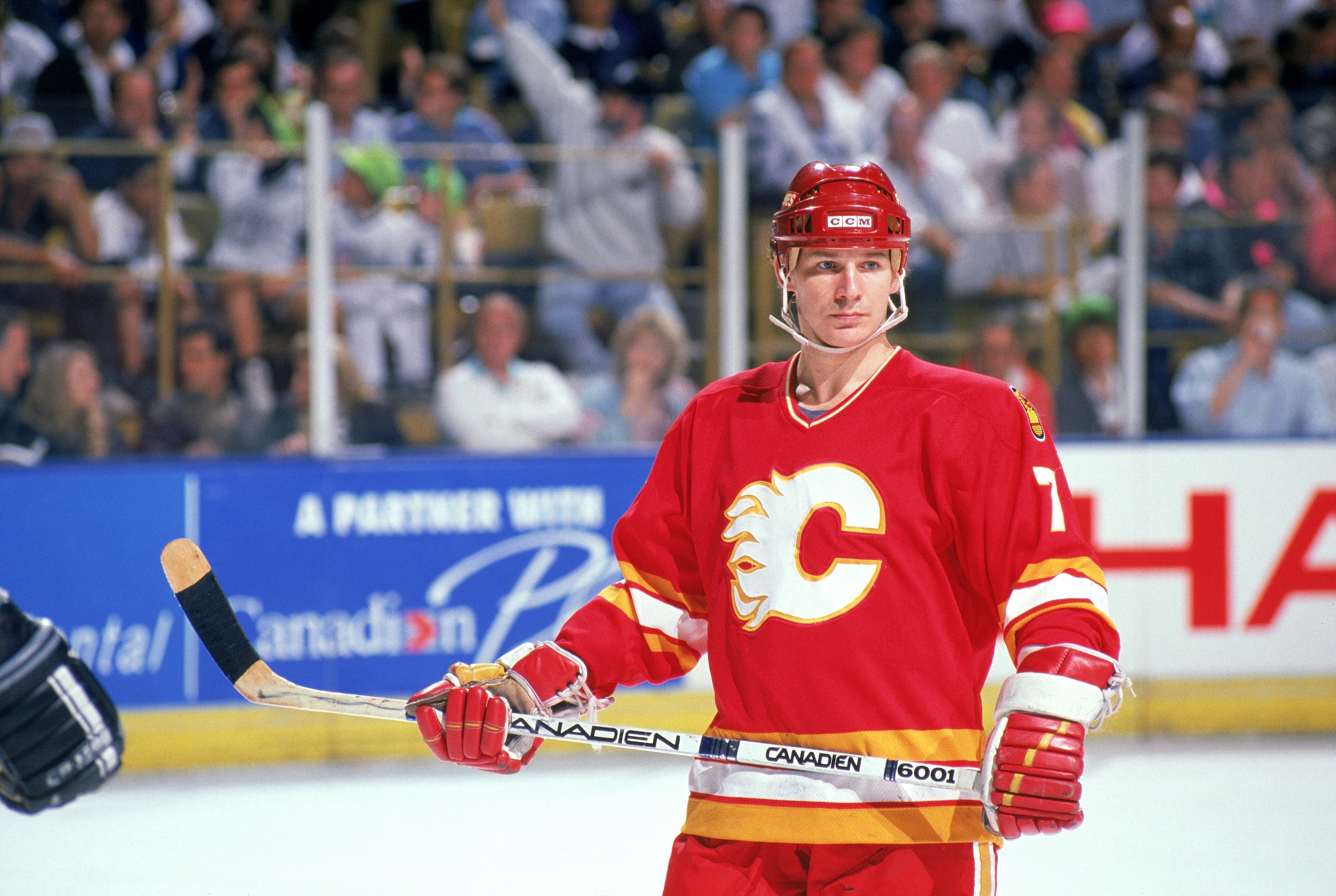 INGLEWOOD, CA - 1990:  Forward Joe Mullen #7 of the Calgary Flames skates against the Los Angeles Kings during a 1989-90 NHL Playoff Game at the Great Western Forum in Inglewood, California.  (Photo by Mike Powell/Getty Images)