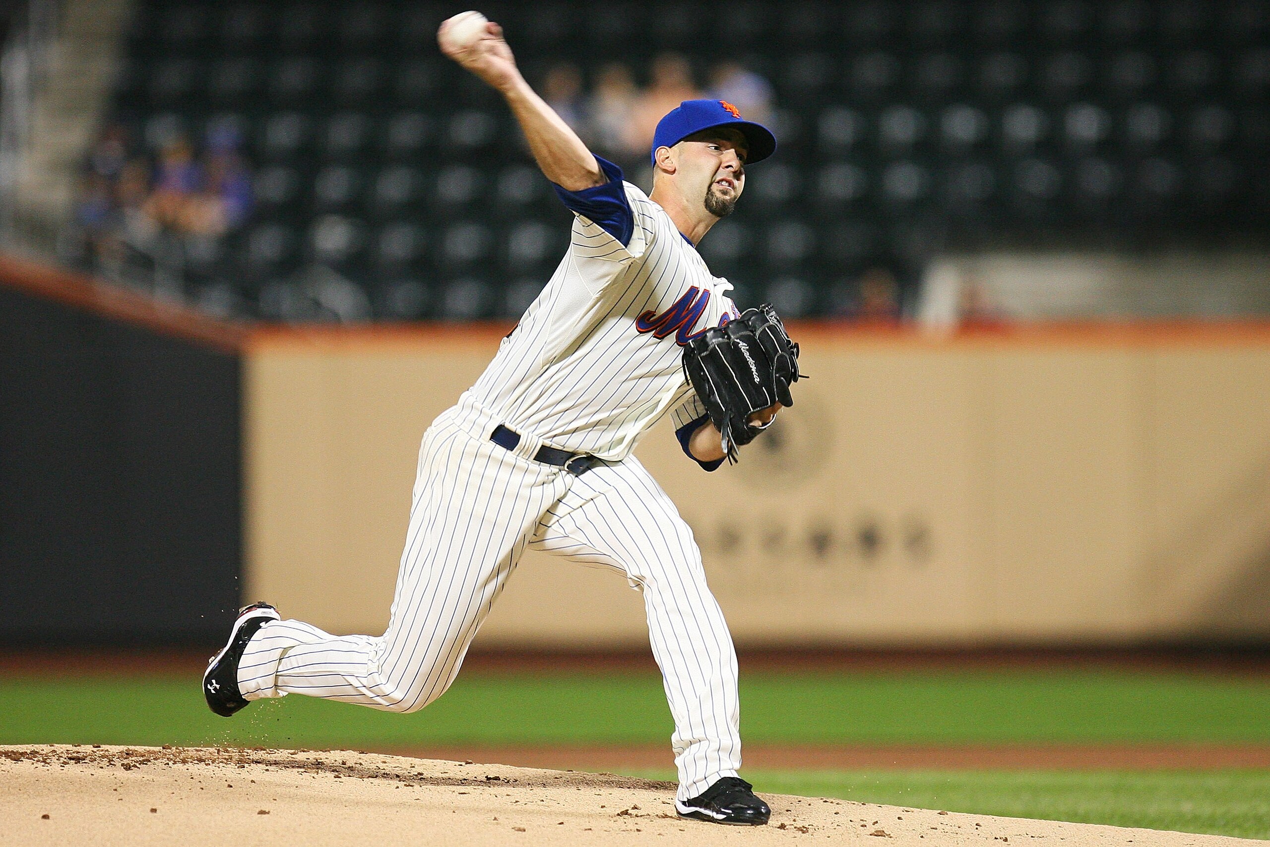 NEW YORK - SEPTEMBER 30:  Dillon Gee #35 of the New York Mets pitches against the Milwaukee Brewers during their game on September 30, 2010 at Citi Field in the Flushing neighborhood of the Queens borough of New York City.  (Photo by Andrew Burton/Getty I