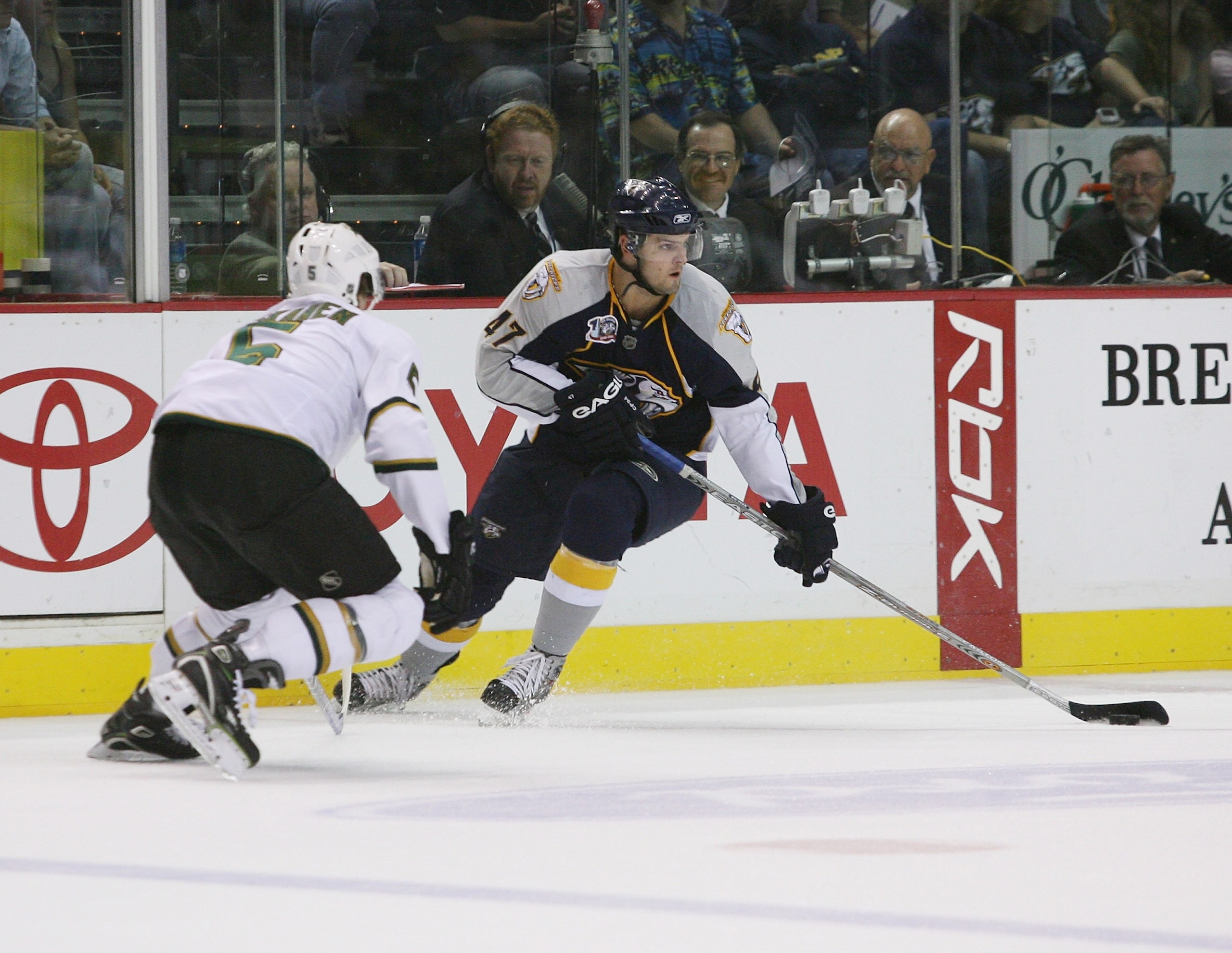NASHVILLE, TN - OCTOBER 06: Alexander Radulov #47 of the Nashville Predators carries the puck through the neutral zone as Matt Niskanen #5 of the Dallas Stars, defends in a game at the Sommet Center on October 6, 2007 in Nashville, Tennessee . The Predato