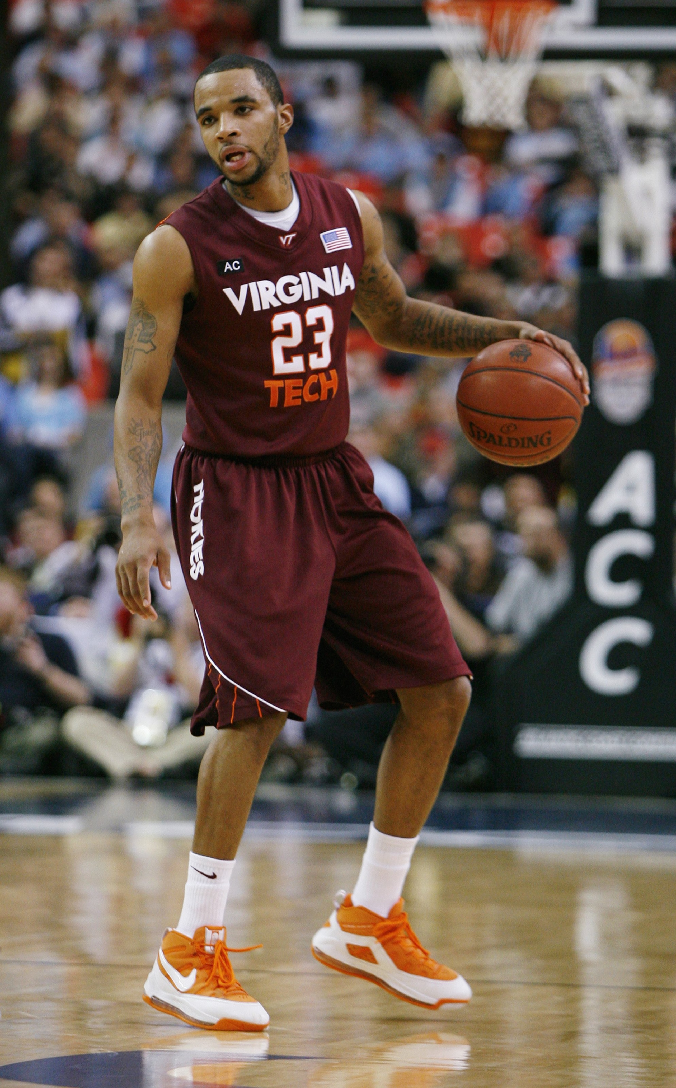 ATLANTA - MARCH 13:  Malcolm Delaney #23 of the Virginia Tech Hokies dribbles against the North Carolina Tar Heels during day two of the 2009 ACC Men's Basketball Tournament on March 13, 2009 at the Georgia Dome in Atlanta, Georgia.  (Photo by Kevin C. Co